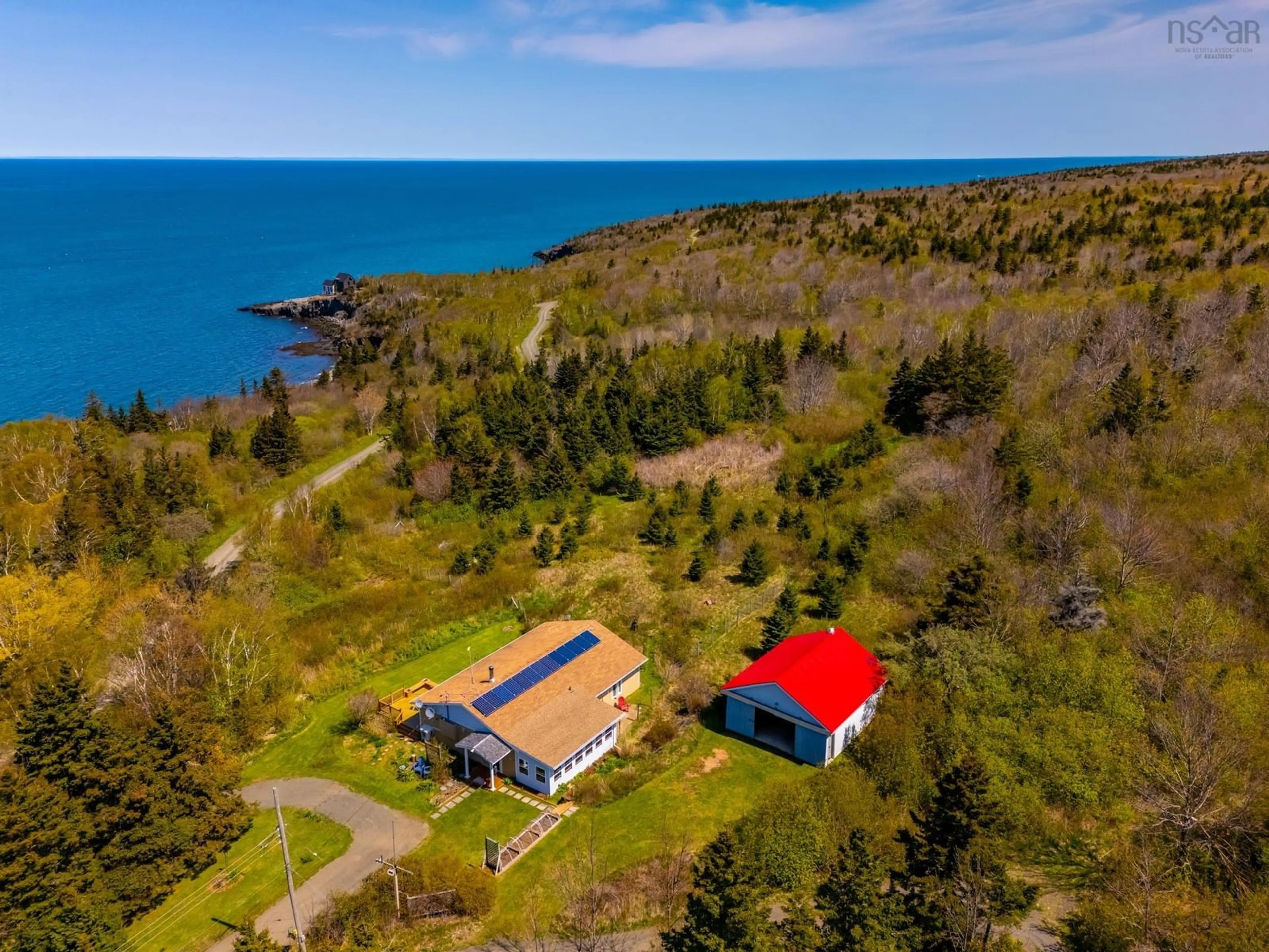 A pic from outside/outdoor area/front of a property/back of a property/a pic from drone, water/lake/river/ocean view for 225 Granville Rd, Victoria Beach Nova Scotia B0S 1A0