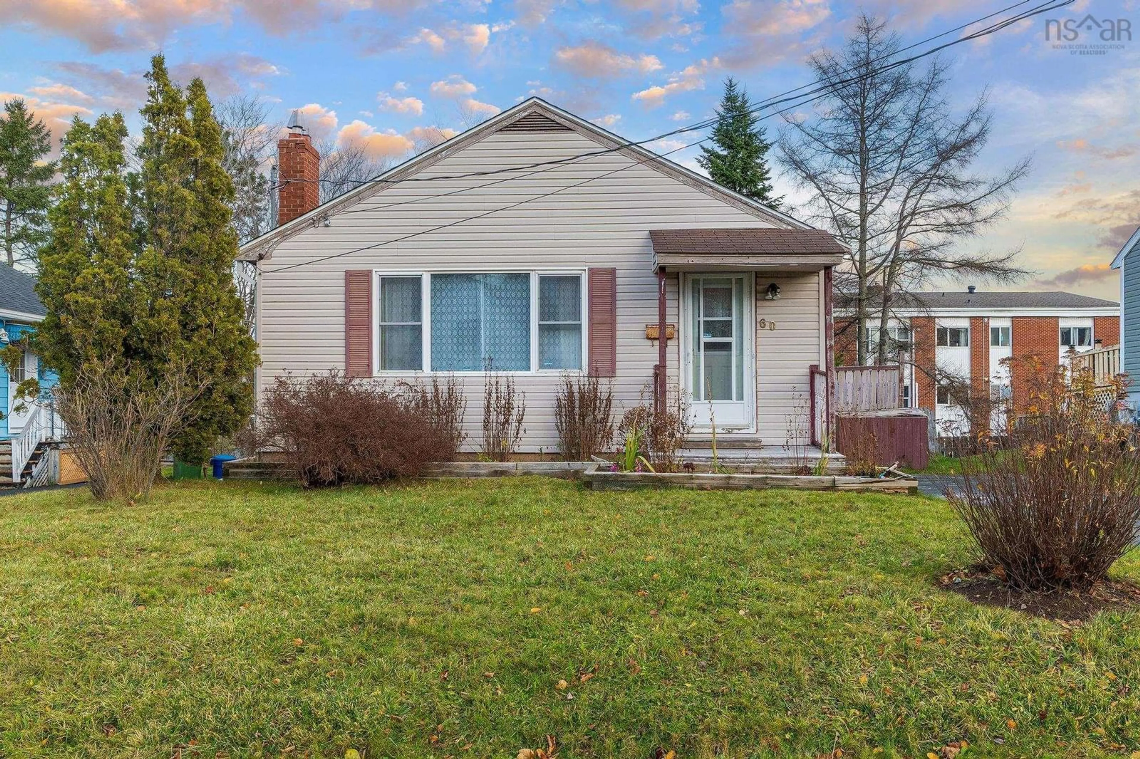 Home with vinyl exterior material, street for 60 Thornhill Dr, Spryfield Nova Scotia B3R 2B4