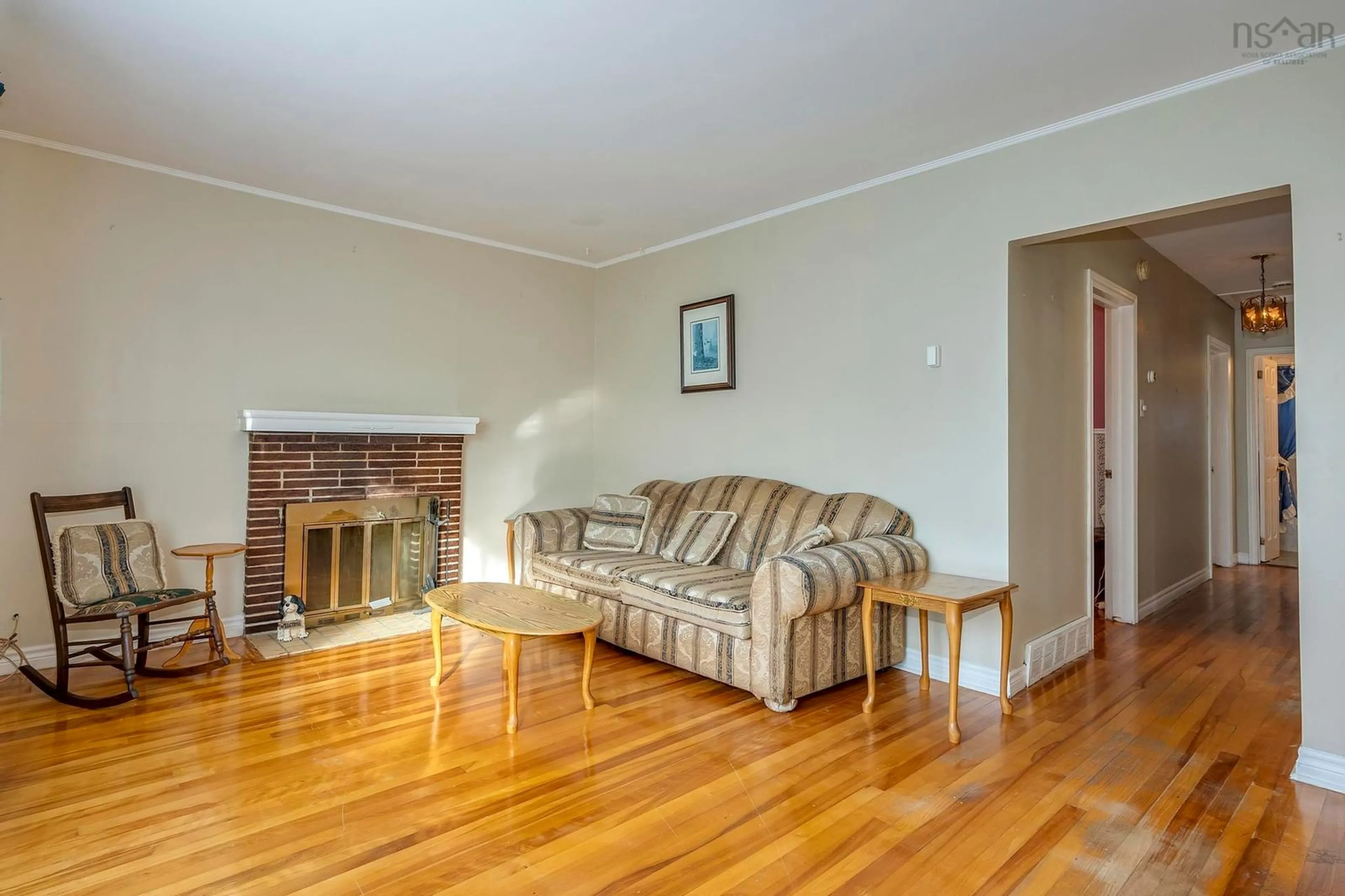 Living room with furniture, wood/laminate floor for 60 Thornhill Dr, Spryfield Nova Scotia B3R 2B4