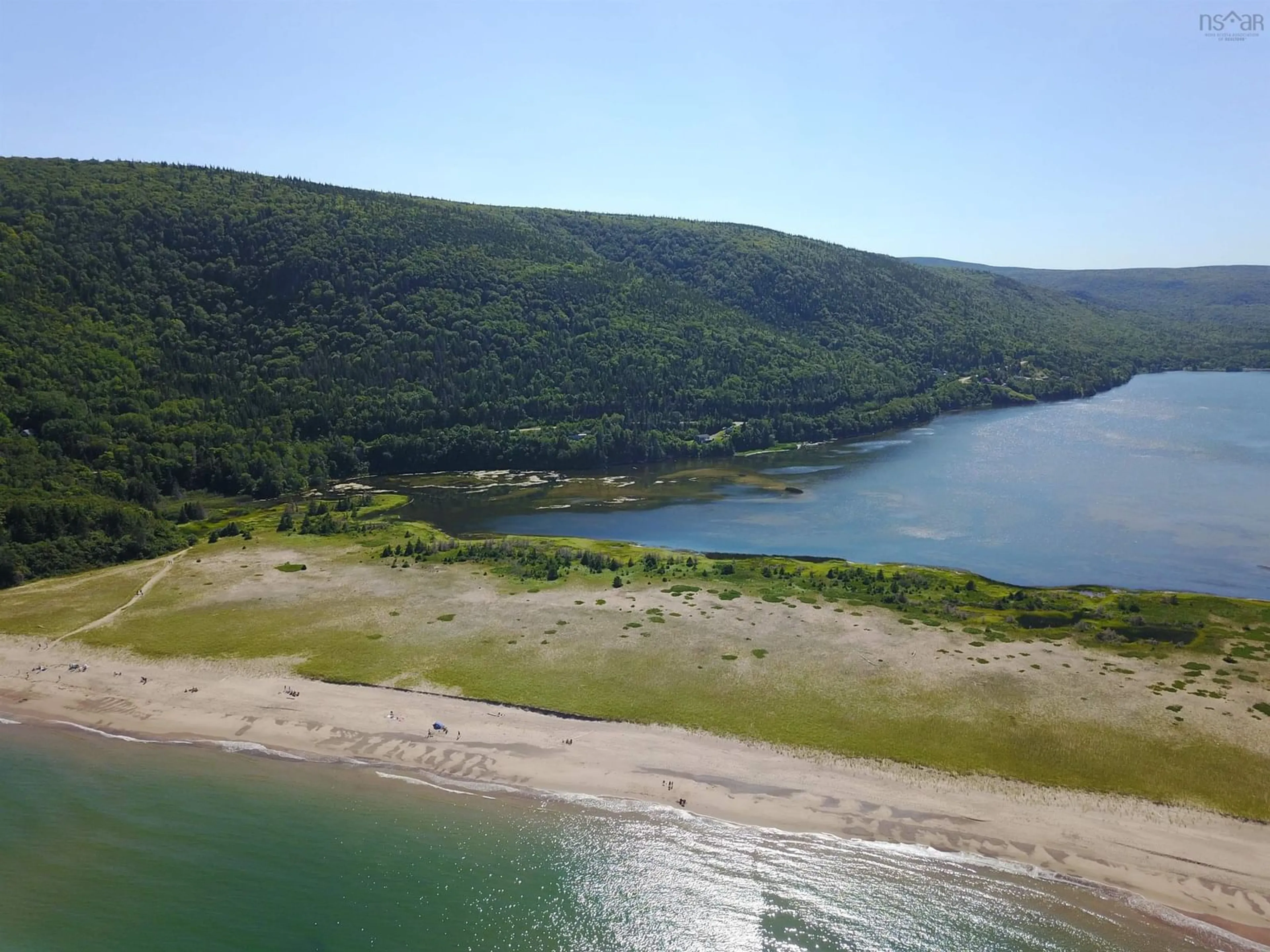 A pic from outside/outdoor area/front of a property/back of a property/a pic from drone, water/lake/river/ocean view for 659 White Point Rd, South Harbour Nova Scotia B0C 1G0