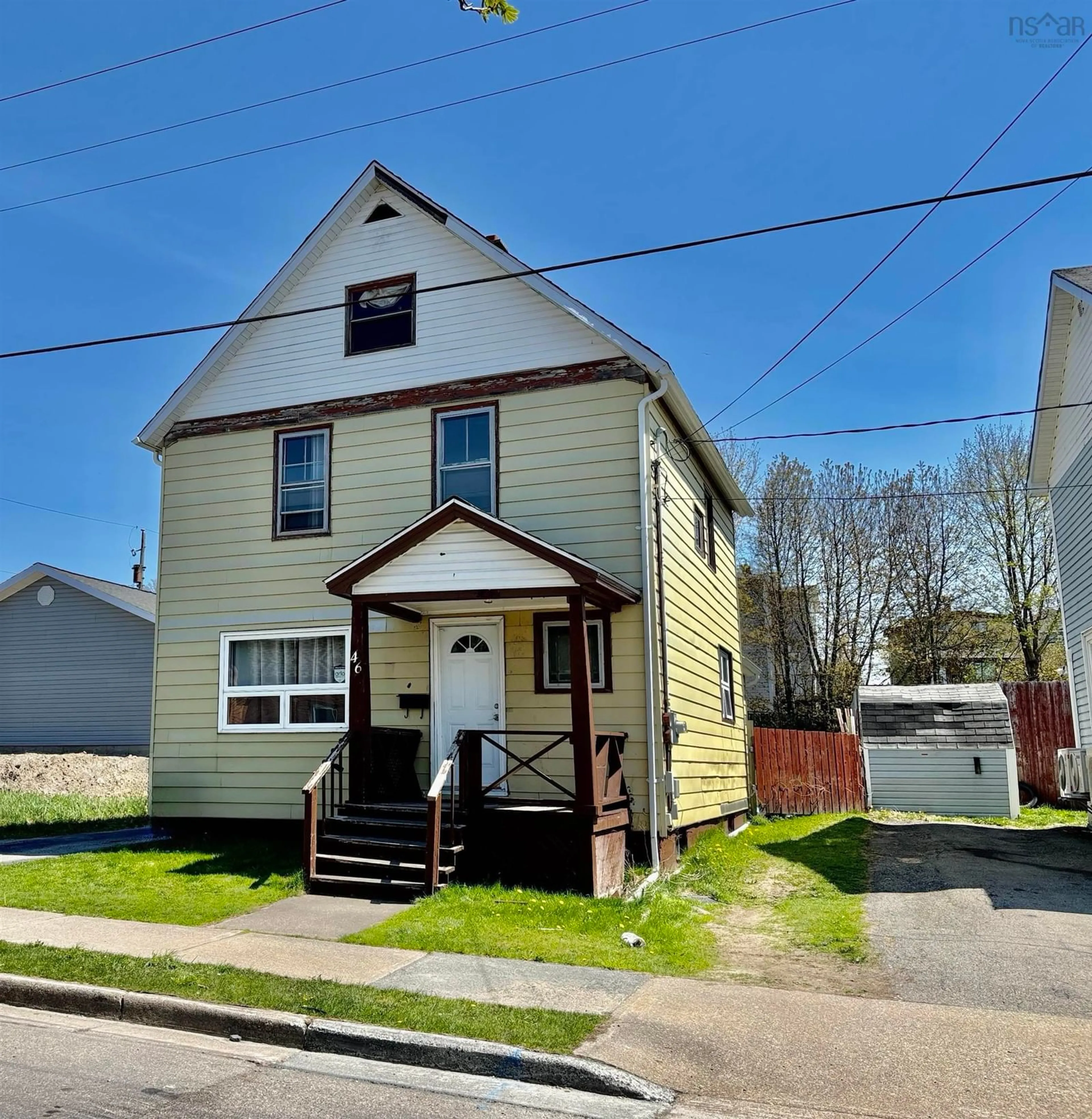 Home with vinyl exterior material, street for 46 West St, Sydney Nova Scotia B1N 1R7