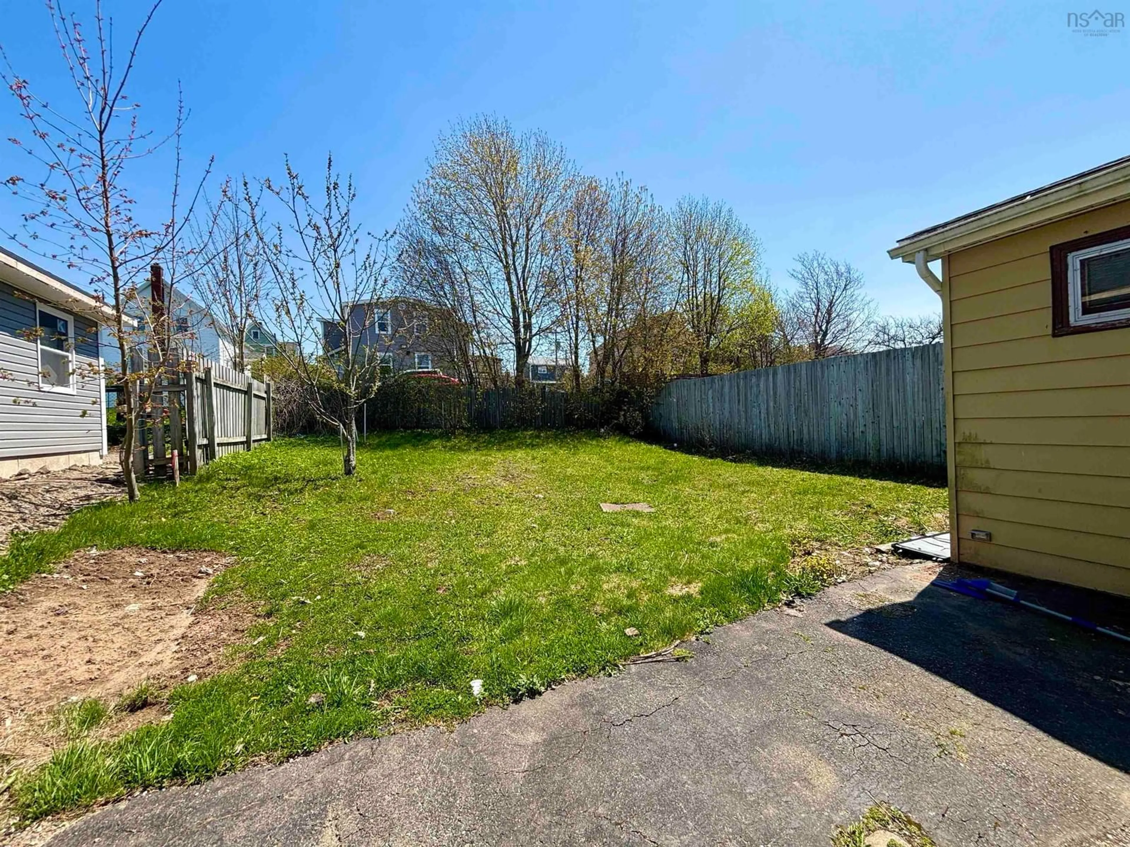 A pic from outside/outdoor area/front of a property/back of a property/a pic from drone, street for 46 West St, Sydney Nova Scotia B1N 1R7
