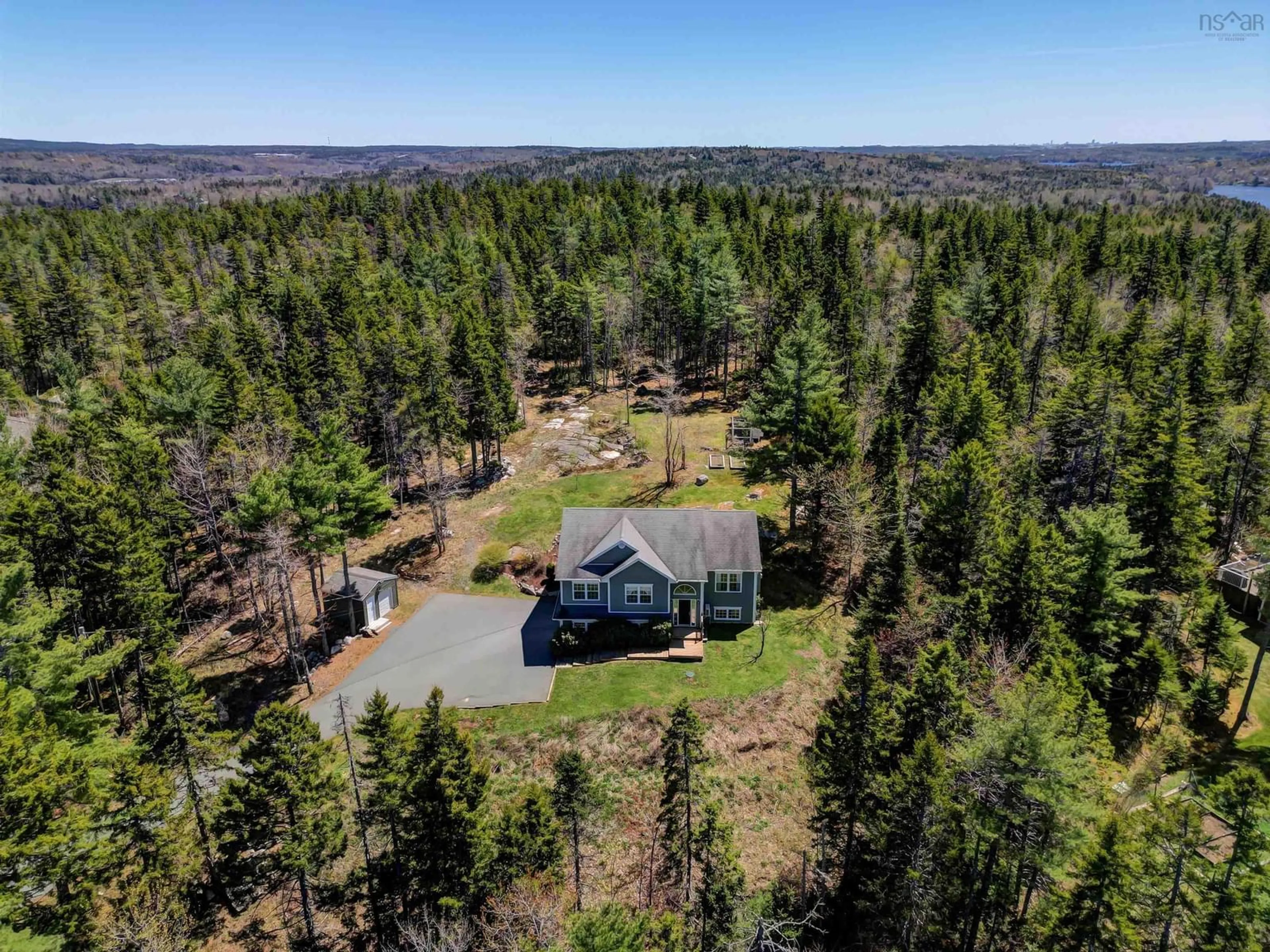 A pic from outside/outdoor area/front of a property/back of a property/a pic from drone, forest/trees view for 162 Beaverbrook Dr, Fall River Nova Scotia B2T 0J6