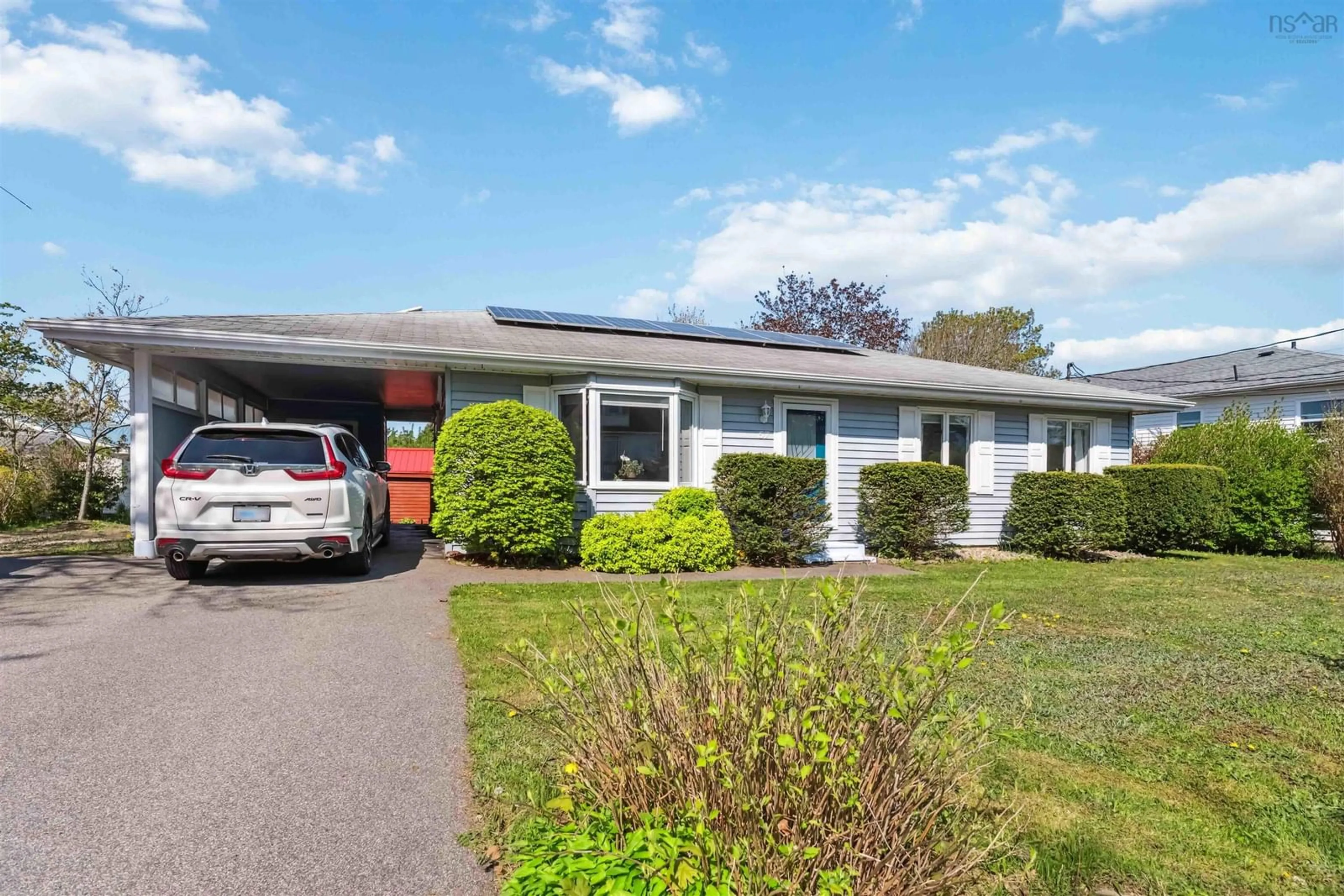 Home with vinyl exterior material, street for 57 First Ave, Digby Nova Scotia B0V 1A0