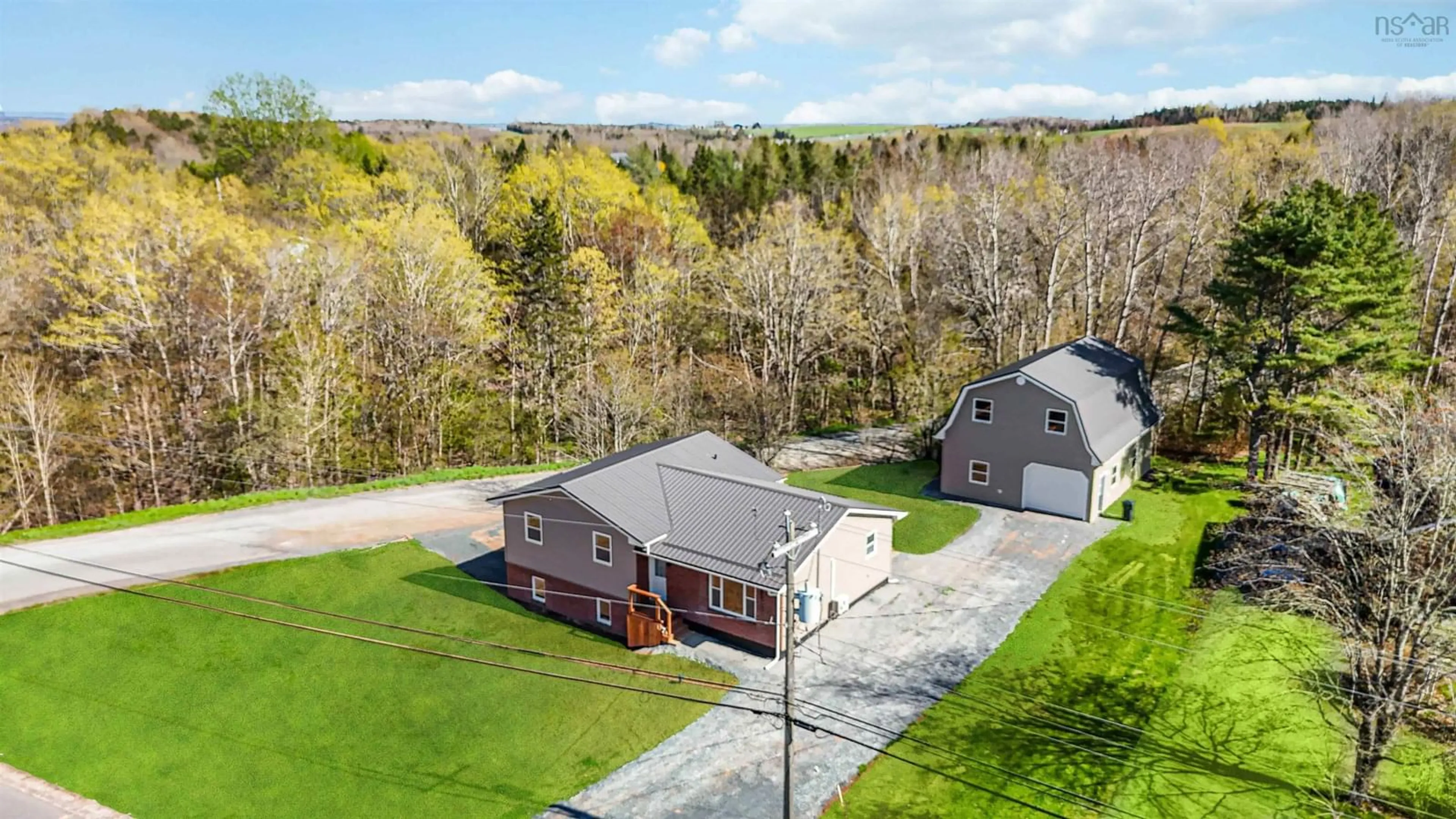 A pic from outside/outdoor area/front of a property/back of a property/a pic from drone, unknown for 39 Robinson Rd, Mill Village Nova Scotia B0N 2H0