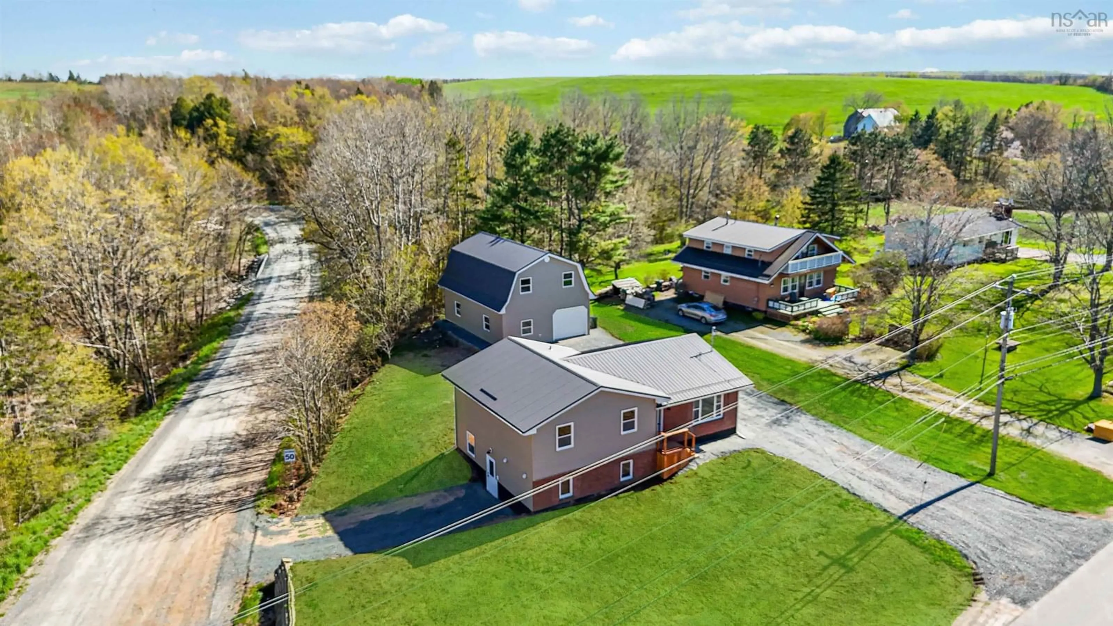 A pic from outside/outdoor area/front of a property/back of a property/a pic from drone, street for 39 Robinson Rd, Mill Village Nova Scotia B0N 2H0