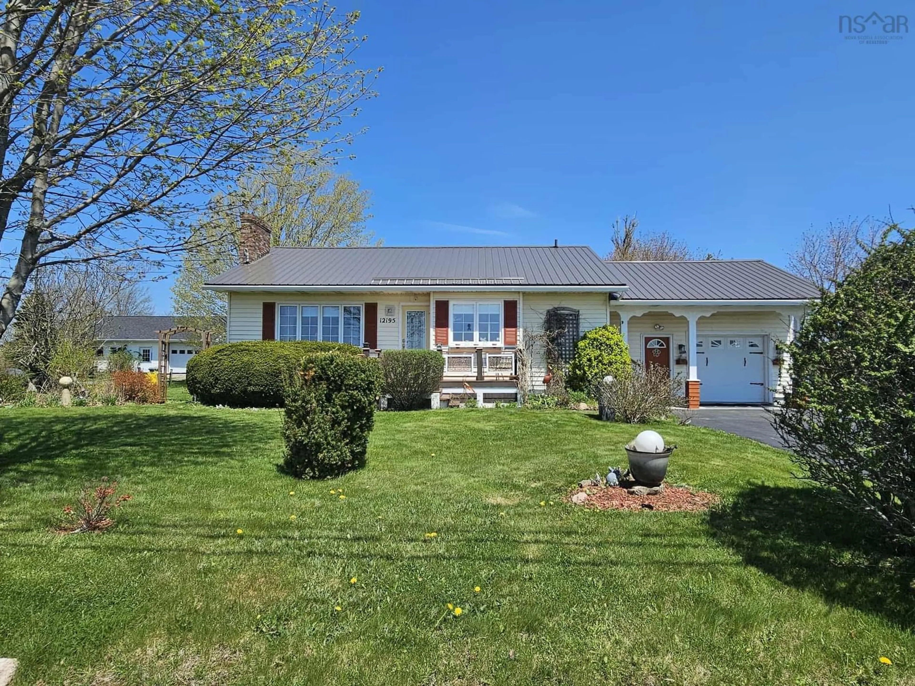 Home with vinyl exterior material, street for 12195 Highway 2, Lower Onslow Nova Scotia B0M 1G0