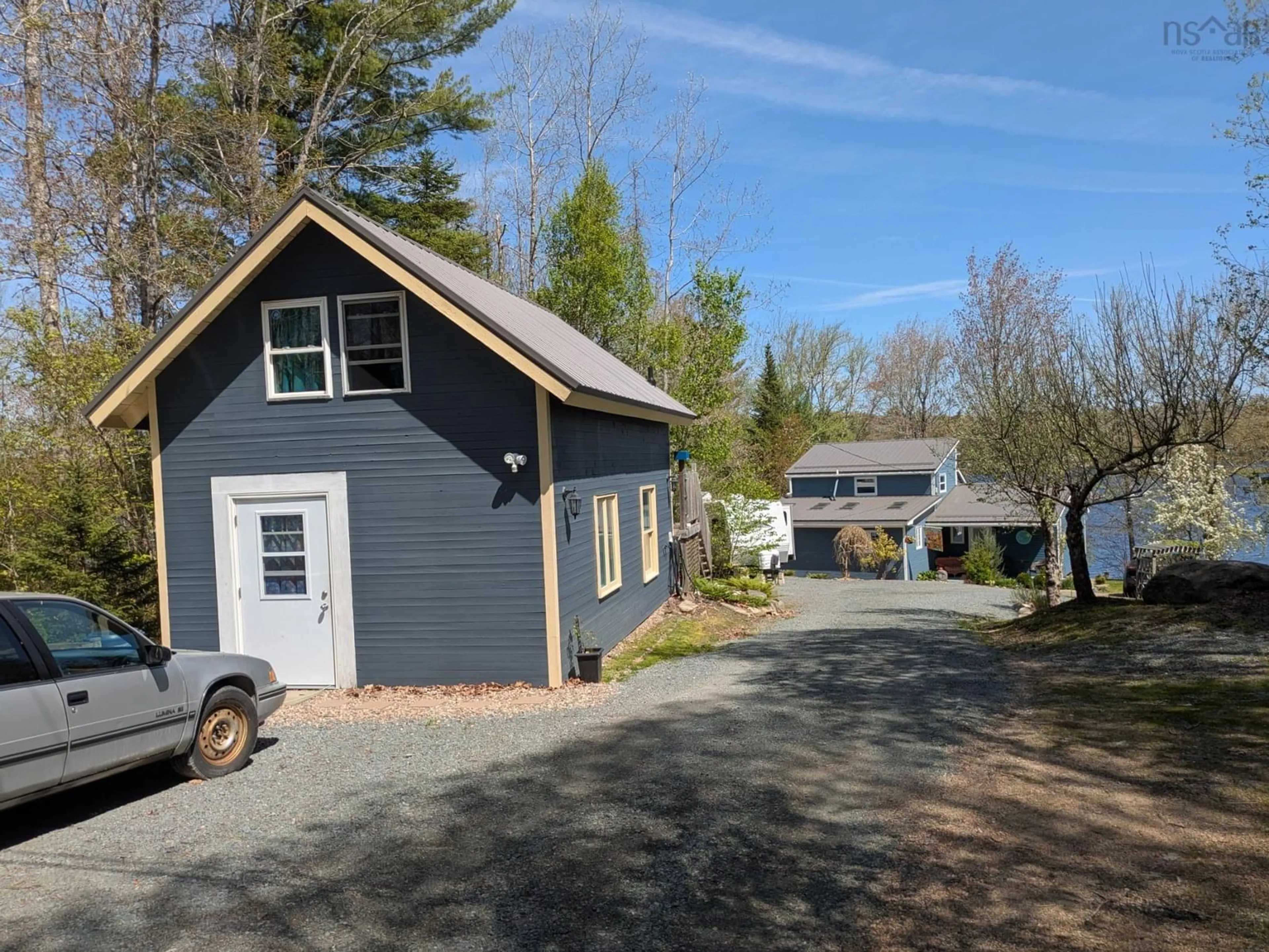 A pic from outside/outdoor area/front of a property/back of a property/a pic from drone, street for 15 Lake Shore Dr, West Clifford Nova Scotia B4V 8H9