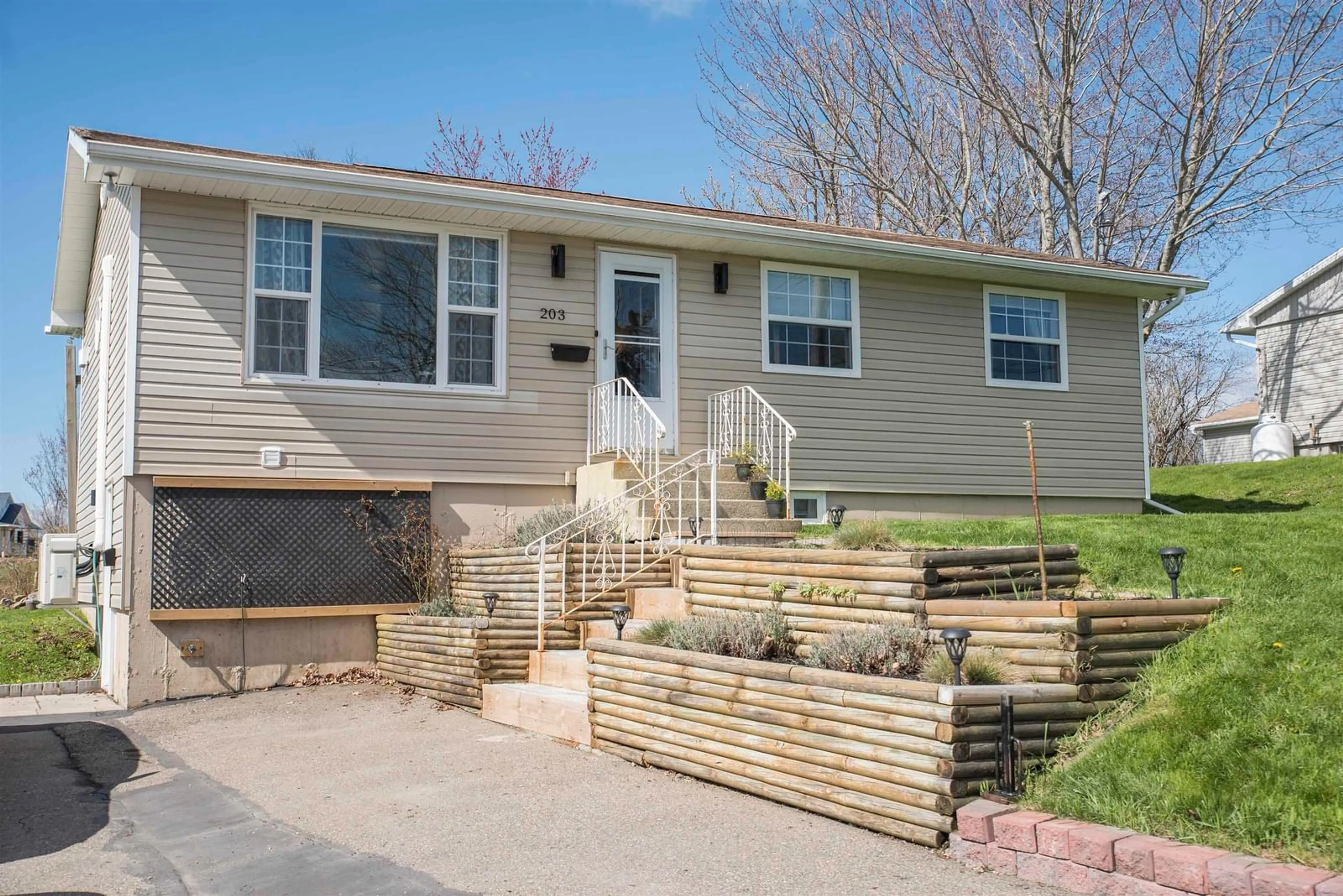Home with vinyl exterior material, street for 203 Leeside Dr, Coxheath Nova Scotia B1R 1S5