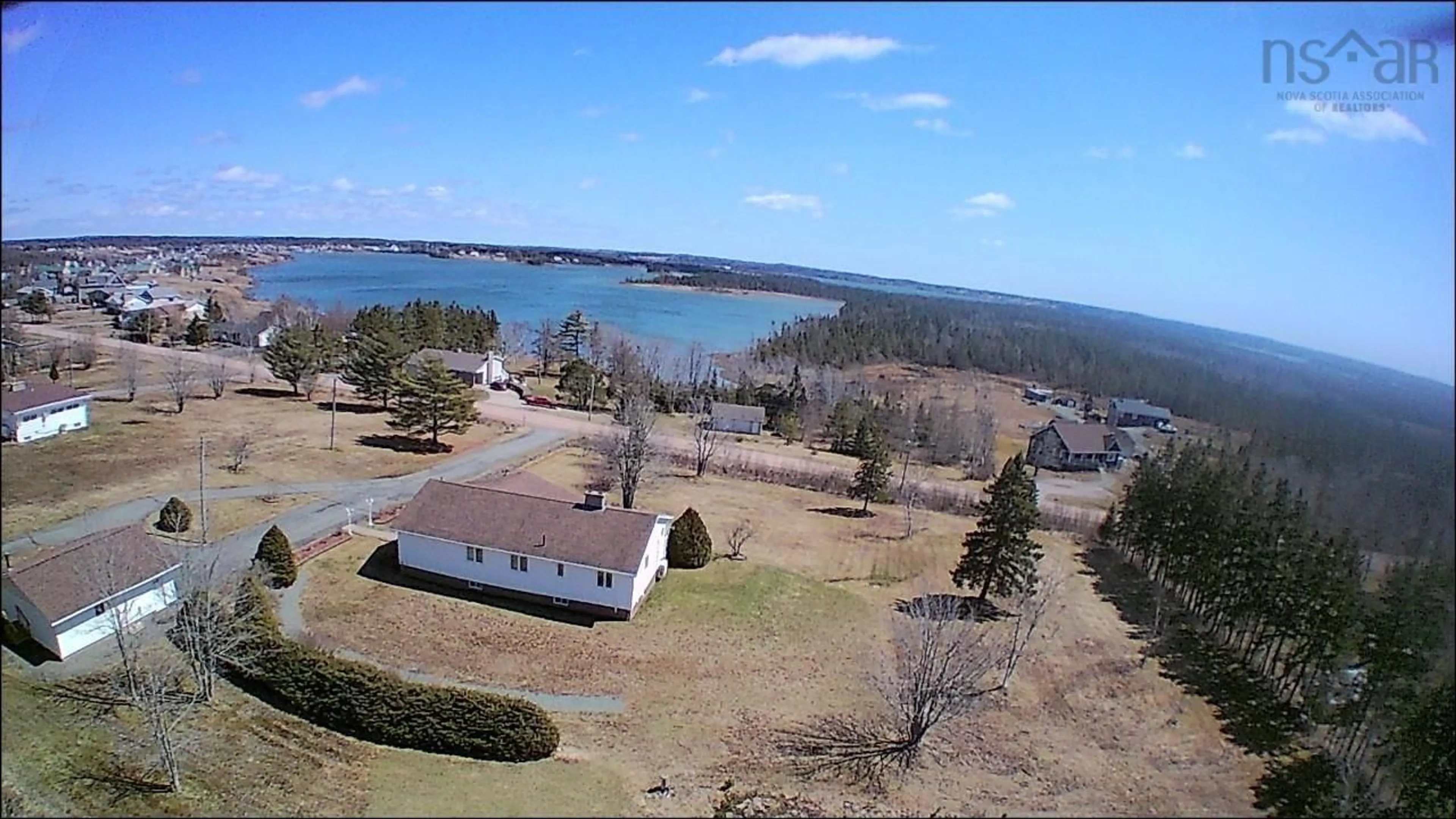 A pic from outside/outdoor area/front of a property/back of a property/a pic from drone, water/lake/river/ocean view for 72 Harbourview Cres, Louisdale Nova Scotia B0E 1V0
