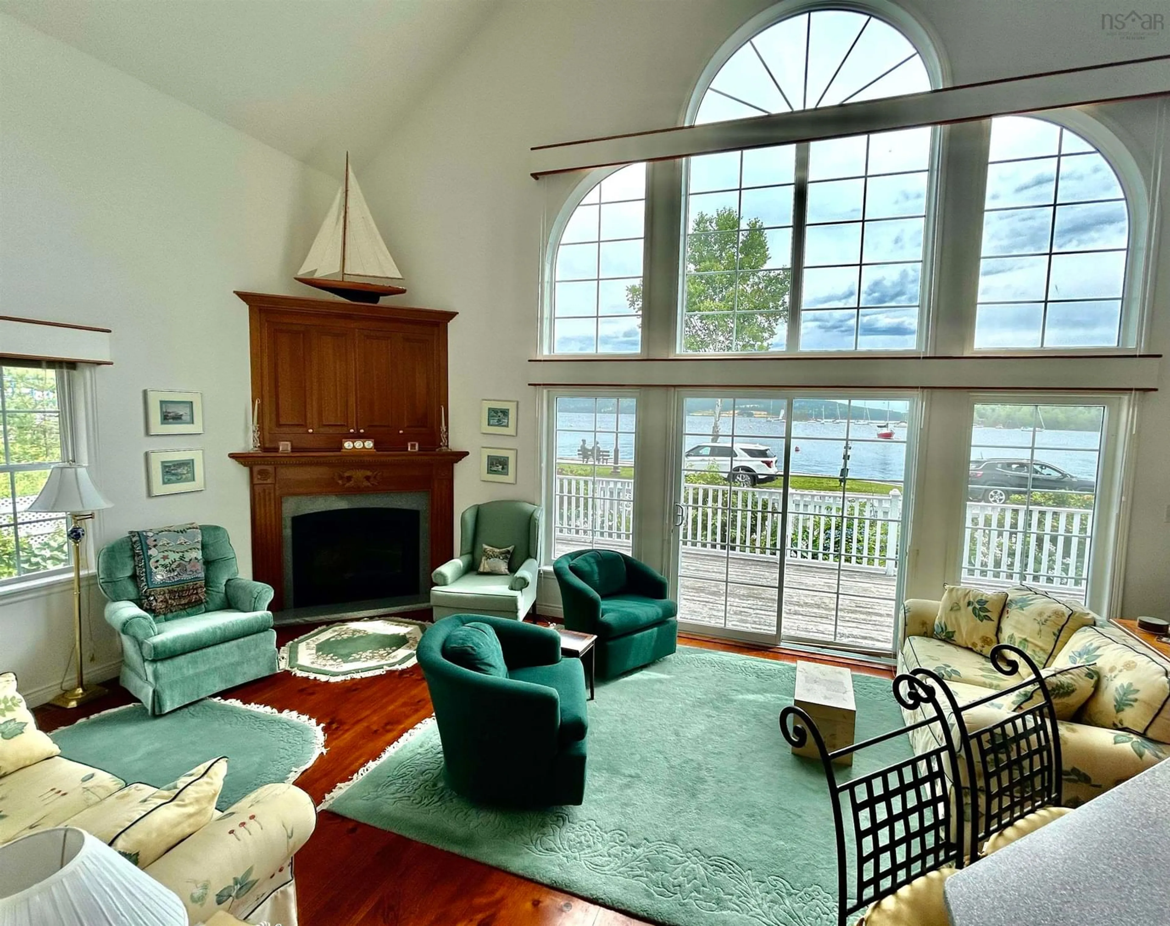 Living room with furniture, unknown for 70 Water St, Baddeck Nova Scotia B0E 1B0