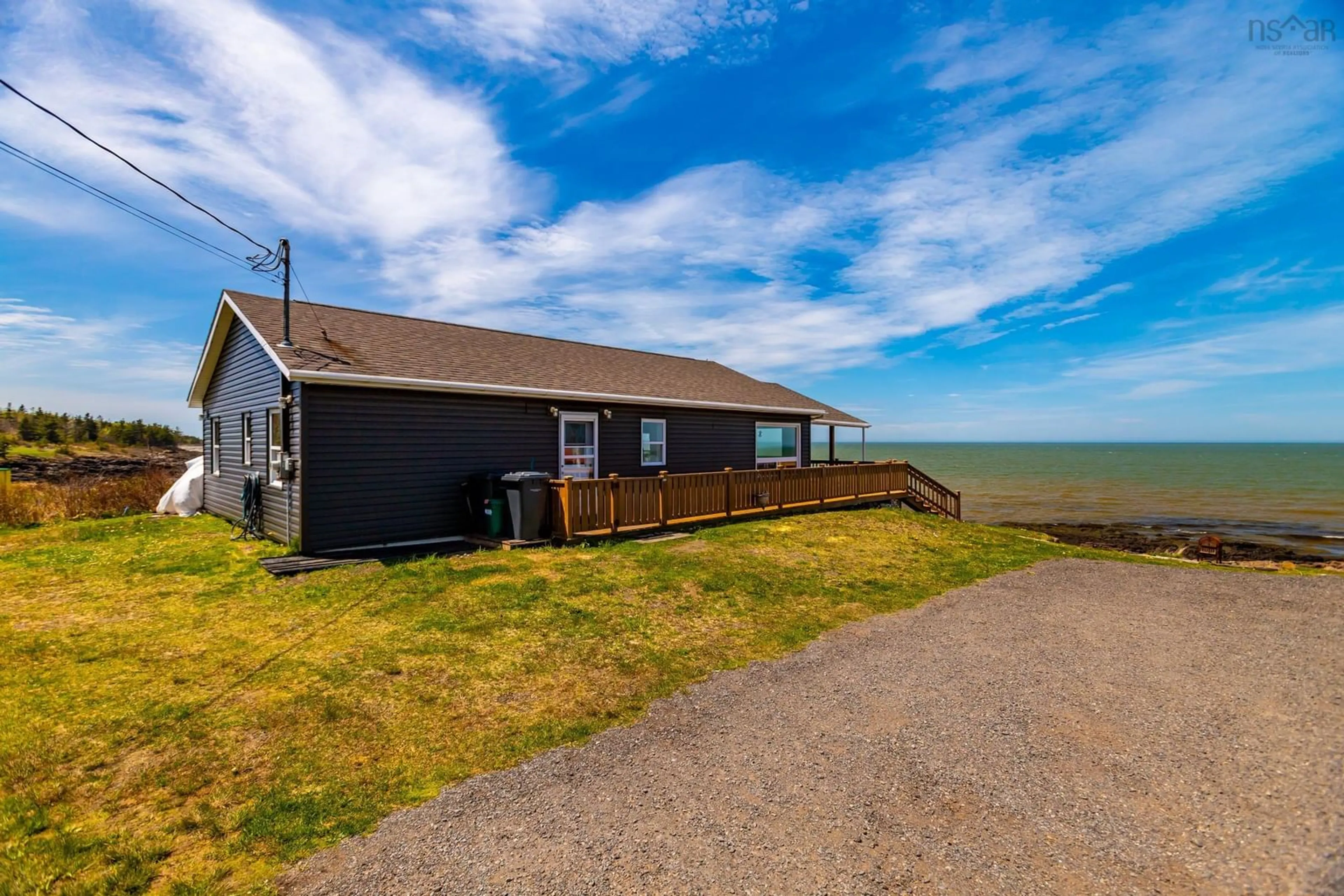 A pic from outside/outdoor area/front of a property/back of a property/a pic from drone, water/lake/river/ocean view for 41 Sunset Ave, Phinneys Cove Nova Scotia B0S 1L0
