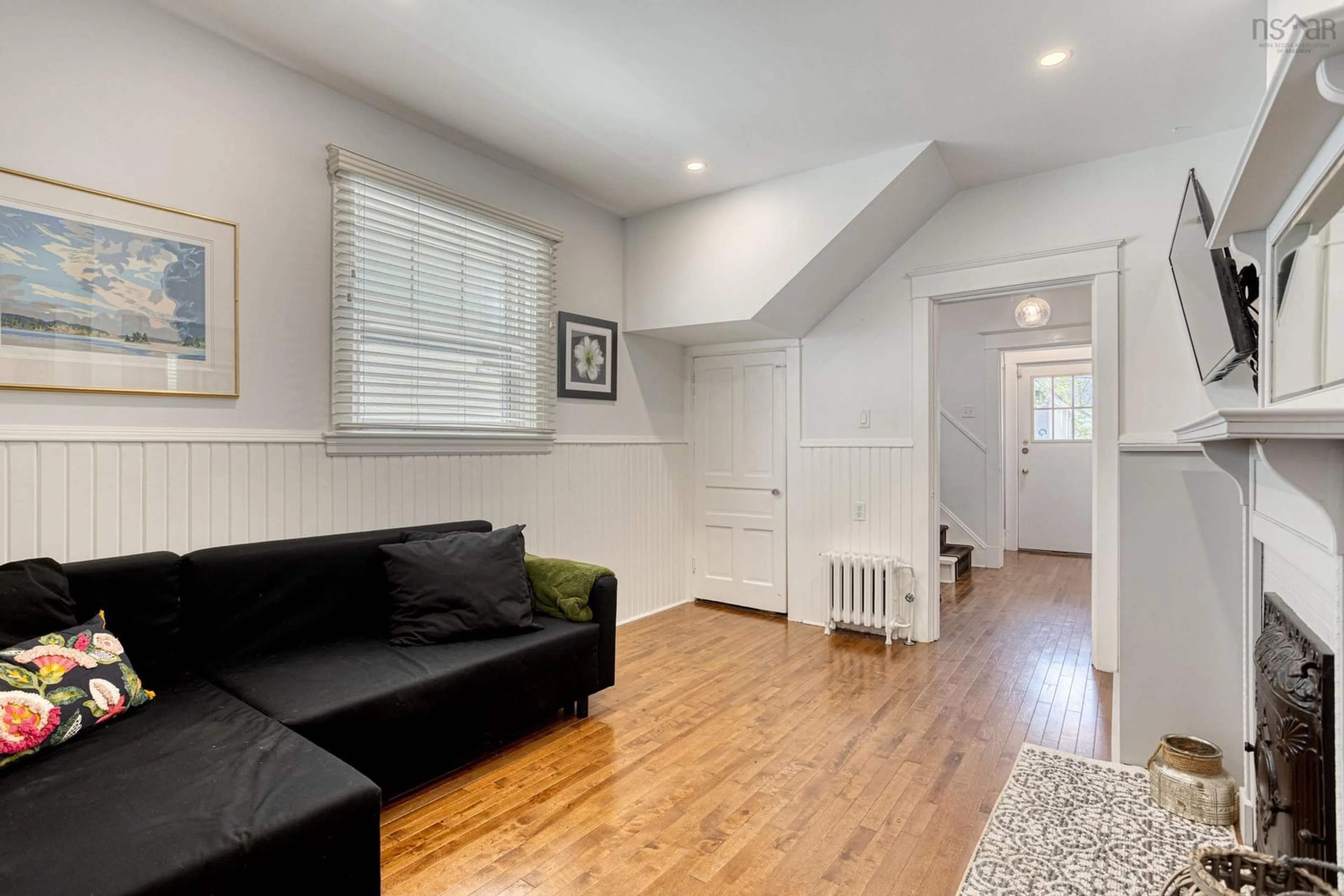 Living room with furniture, wood/laminate floor for 2533 Beech Streets, Halifax Nova Scotia B3L 2X9