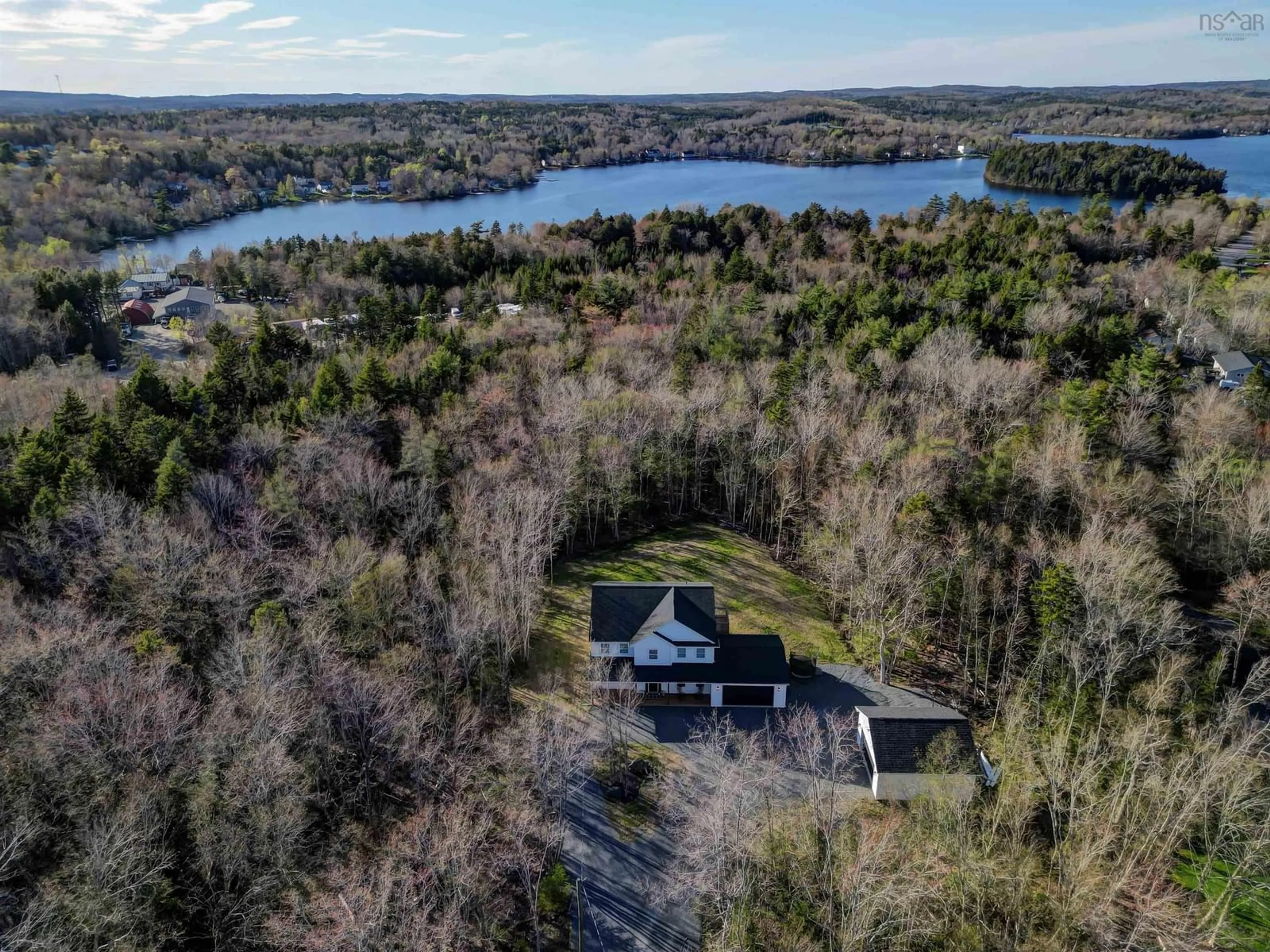 A pic from outside/outdoor area/front of a property/back of a property/a pic from drone, water/lake/river/ocean view for 72 Fenerty Rd, Middle Sackville Nova Scotia B4E 3B1
