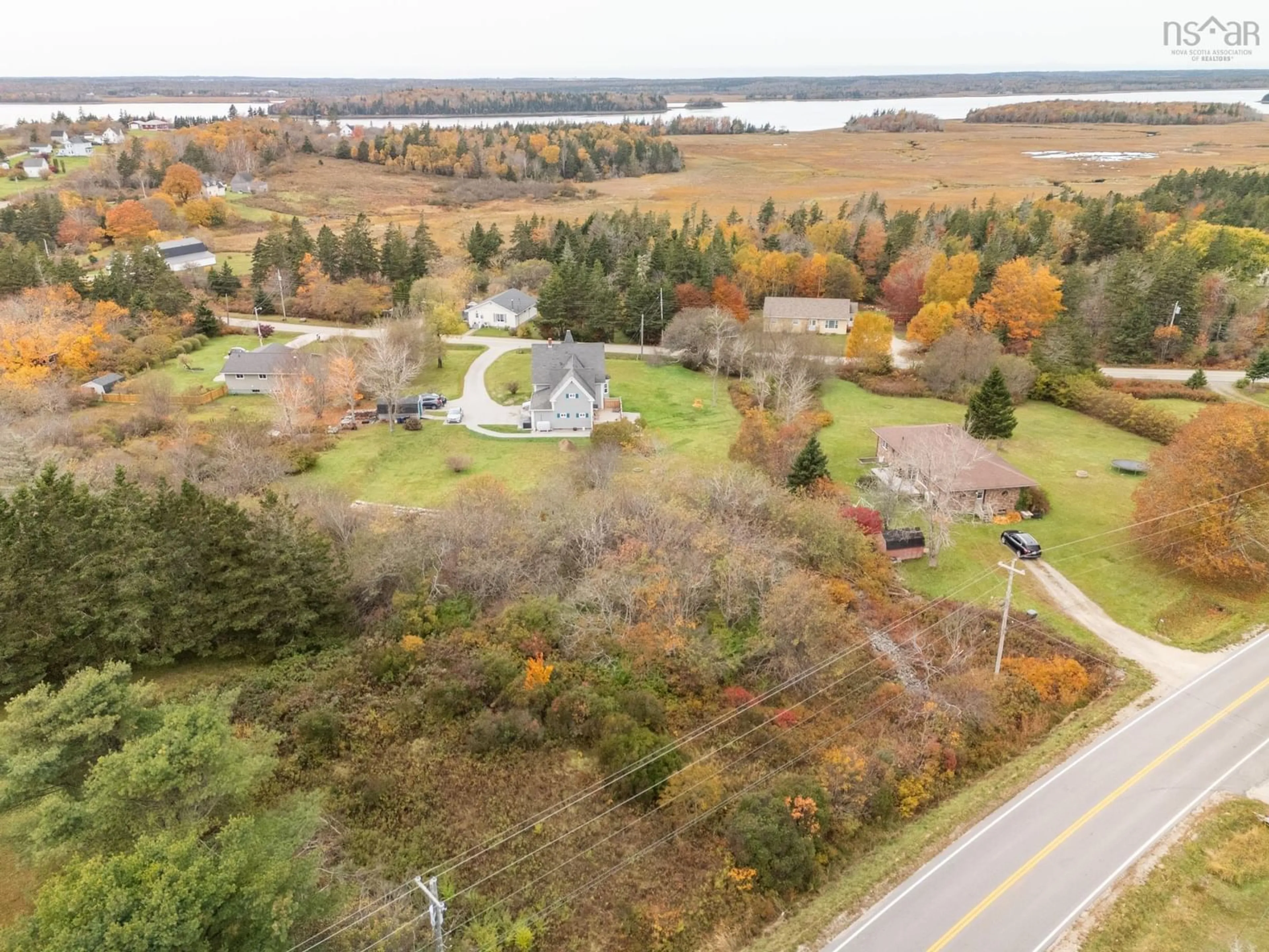A pic from outside/outdoor area/front of a property/back of a property/a pic from drone, water/lake/river/ocean view for 35 Chemin Tour Des Buttes, Amiraults Hill Nova Scotia B0W 3M0