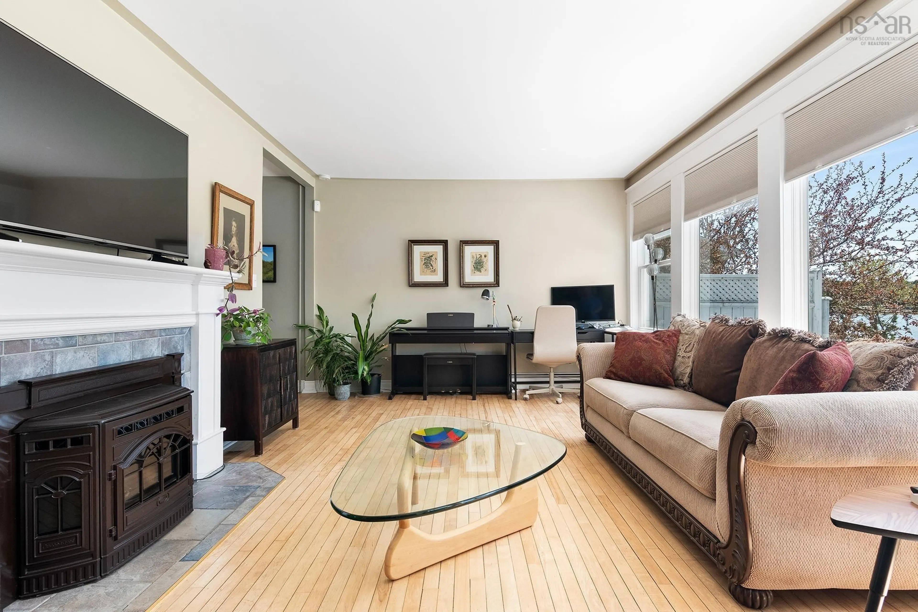 Living room with furniture, wood/laminate floor for 20 Indian Point Road, Glen Haven, Ns, Glen Haven Nova Scotia B3Z 2V1