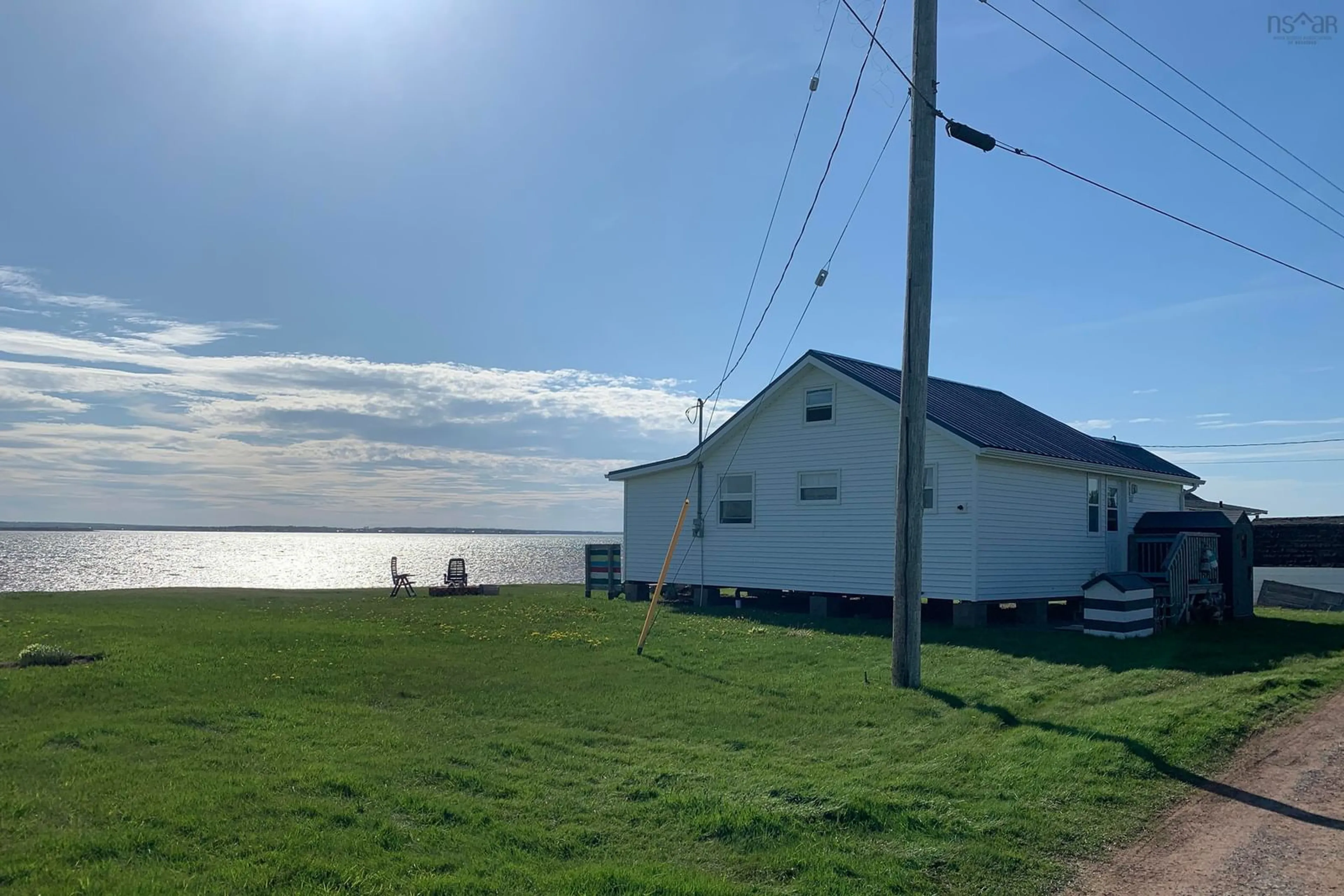 A pic from outside/outdoor area/front of a property/back of a property/a pic from drone, water/lake/river/ocean view for 115 Fishing Point Rd, Pugwash Nova Scotia B0K 1L0