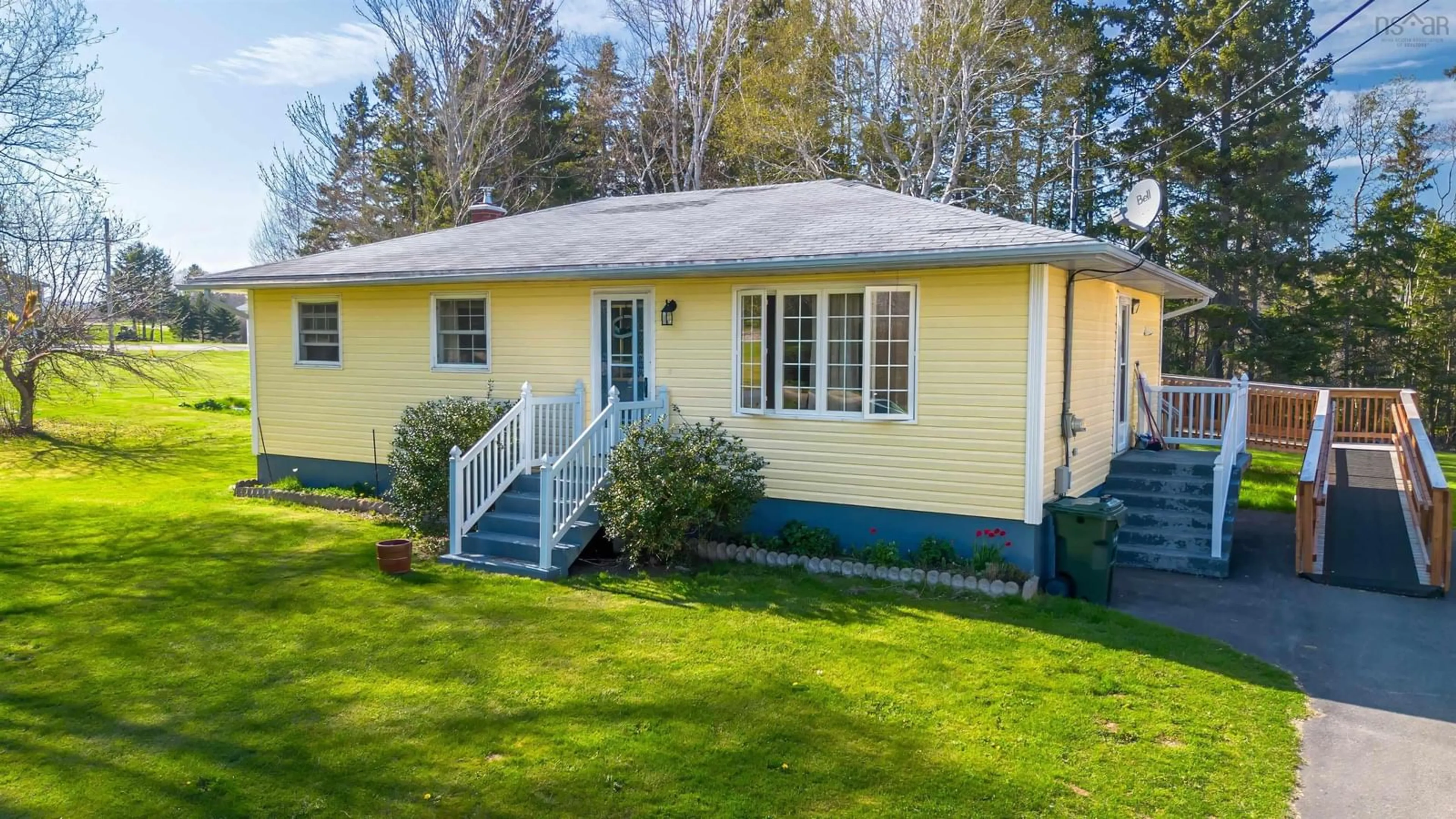 Home with vinyl exterior material, street for 18 Mary St, Mill Creek Nova Scotia B1Y 1X6