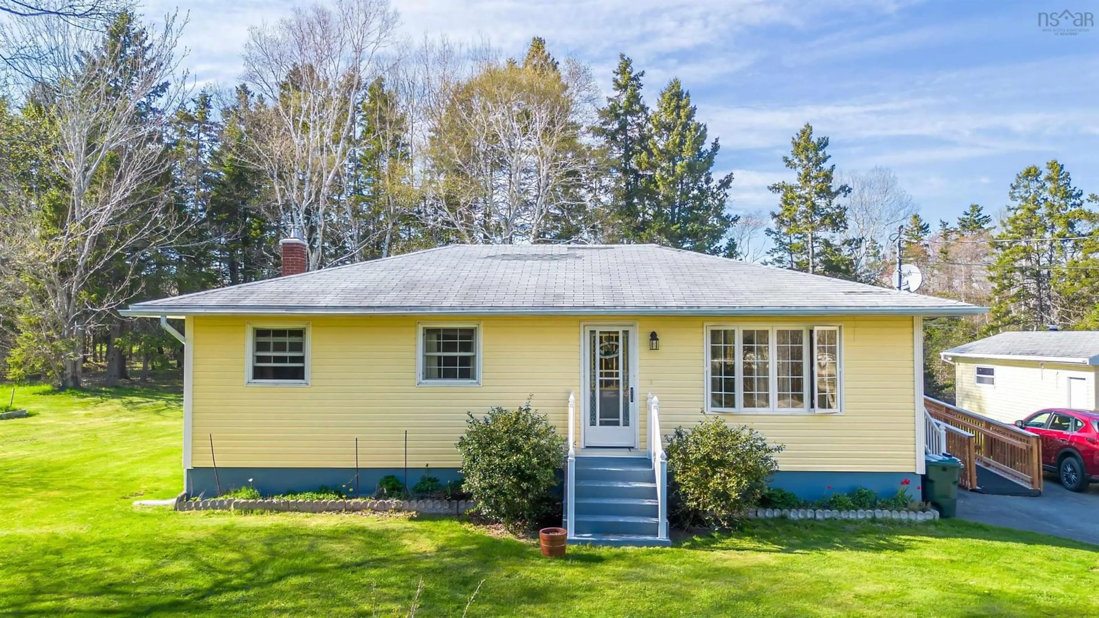 Home with vinyl exterior material, street for 18 Mary St, Mill Creek Nova Scotia B1Y 1X6
