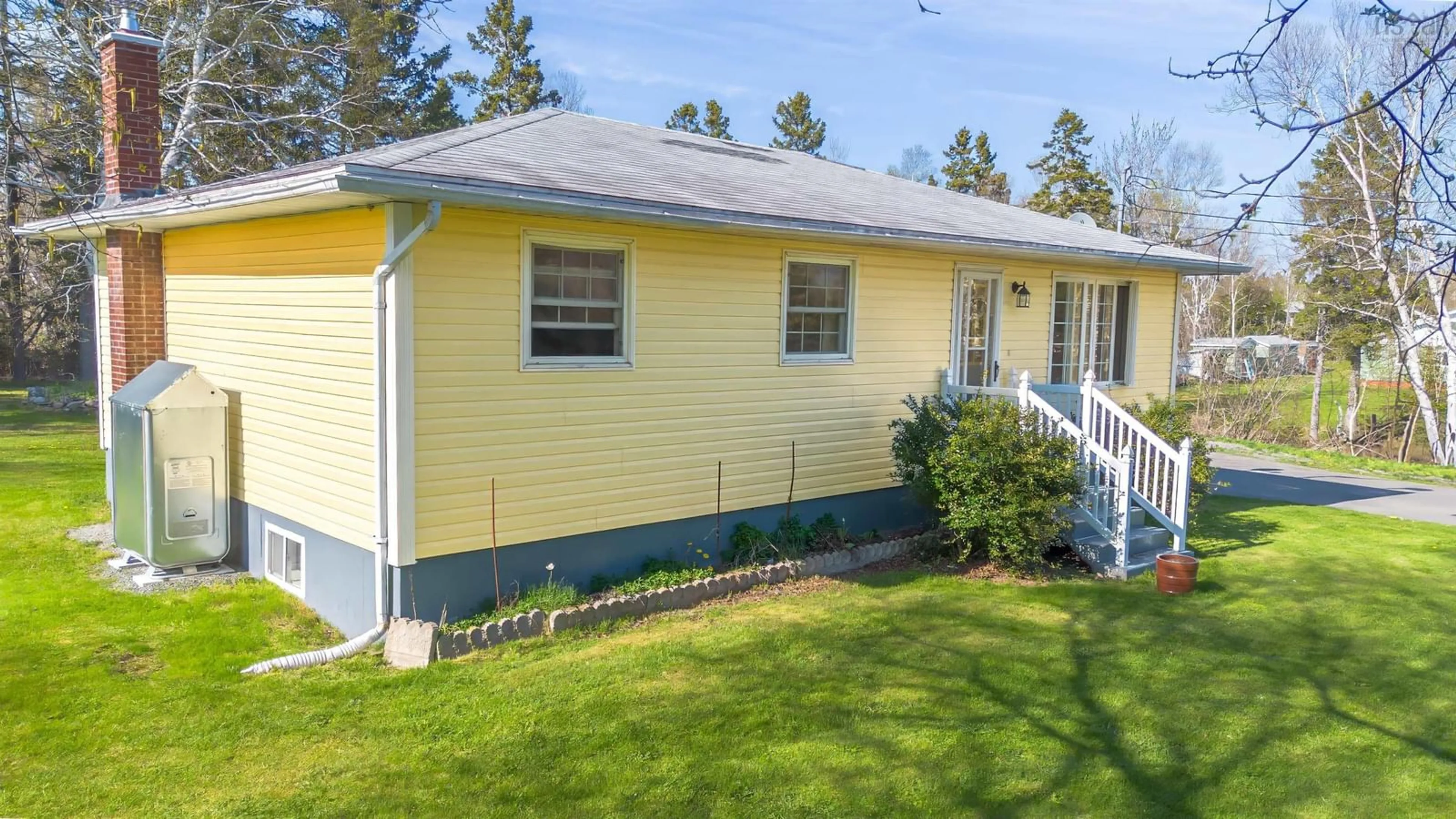 Home with vinyl exterior material, street for 18 Mary St, Mill Creek Nova Scotia B1Y 1X6