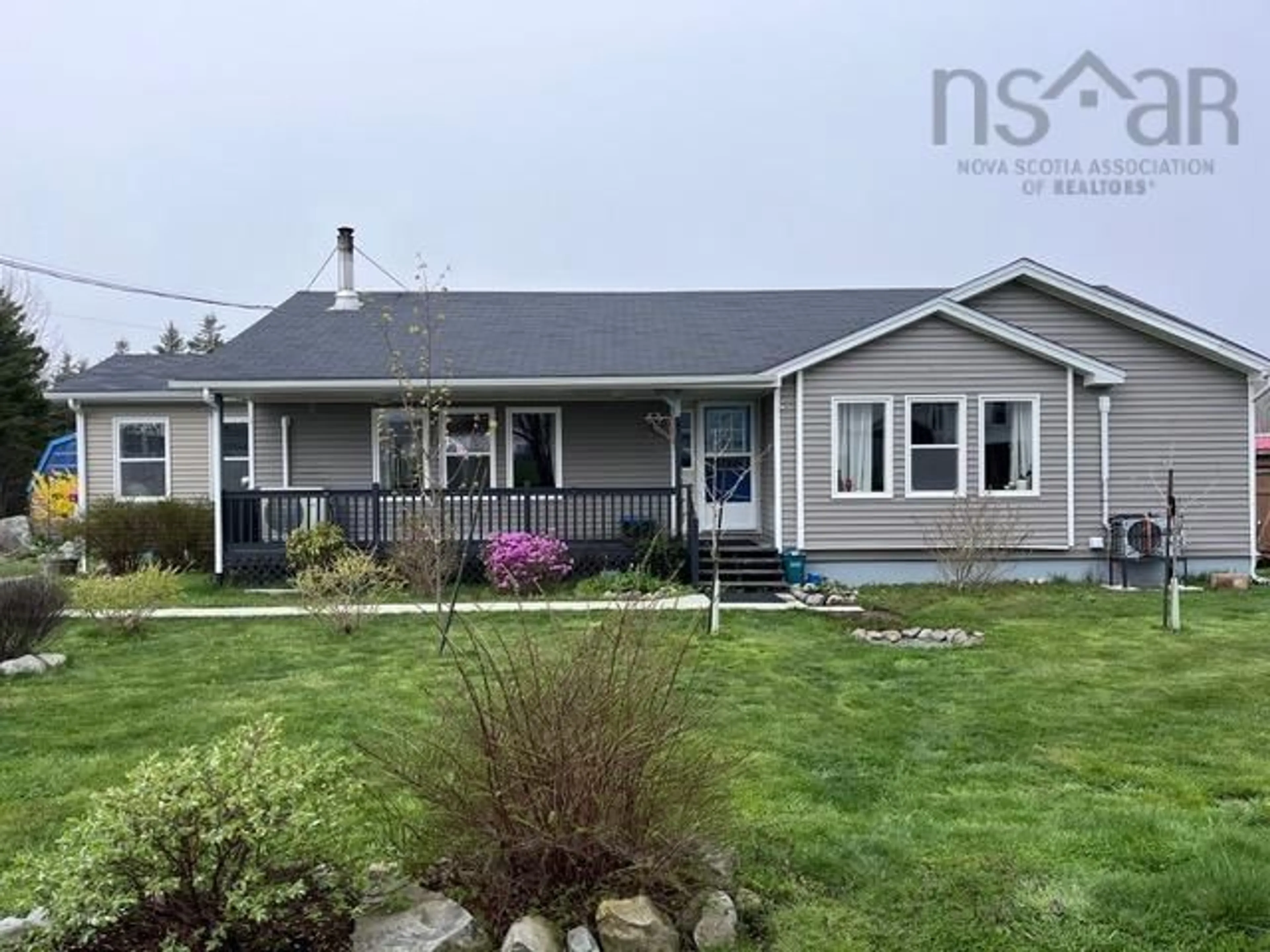 Home with vinyl exterior material, street for 81 Brighton Rd, Lockeport Nova Scotia B0T 1L0
