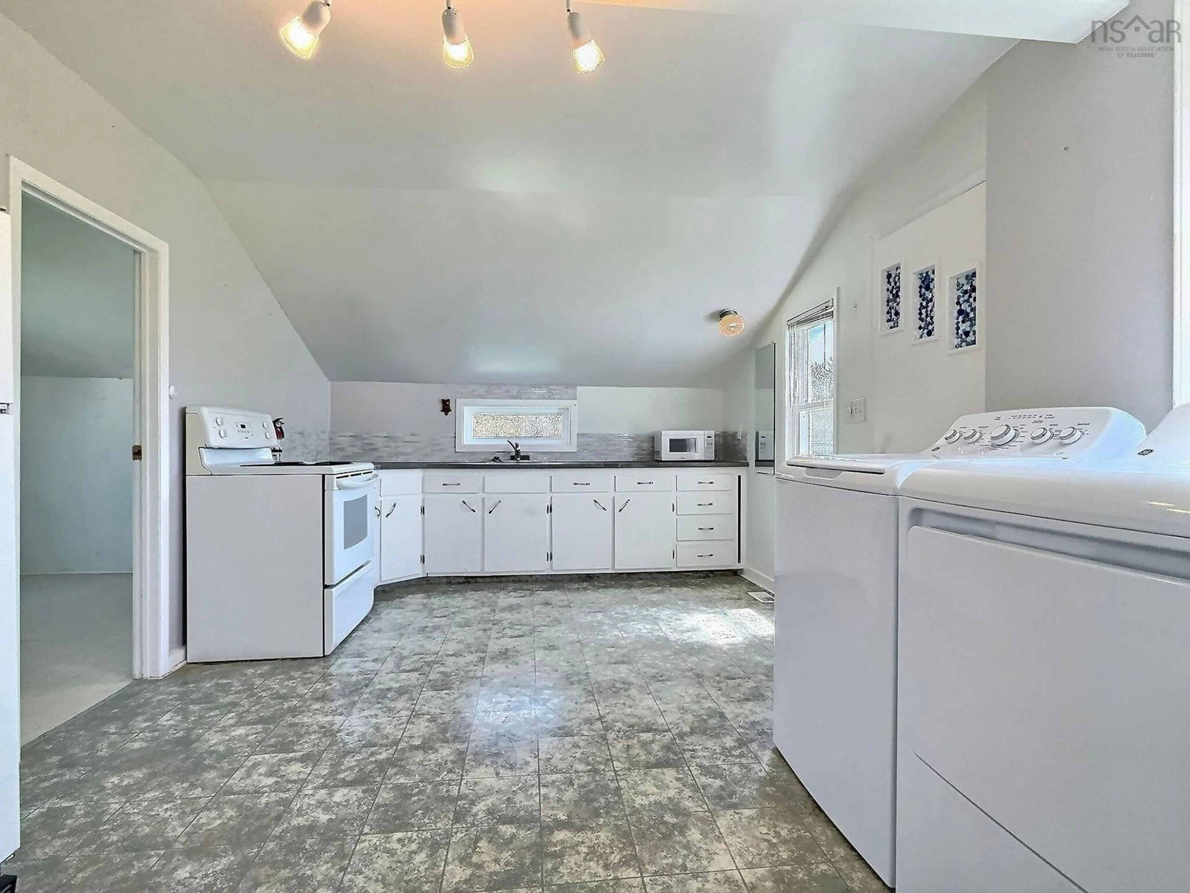 Kitchen with laundary machines, unknown for 224 Lapointe Rd, Petit Étang Nova Scotia B0E 1H0