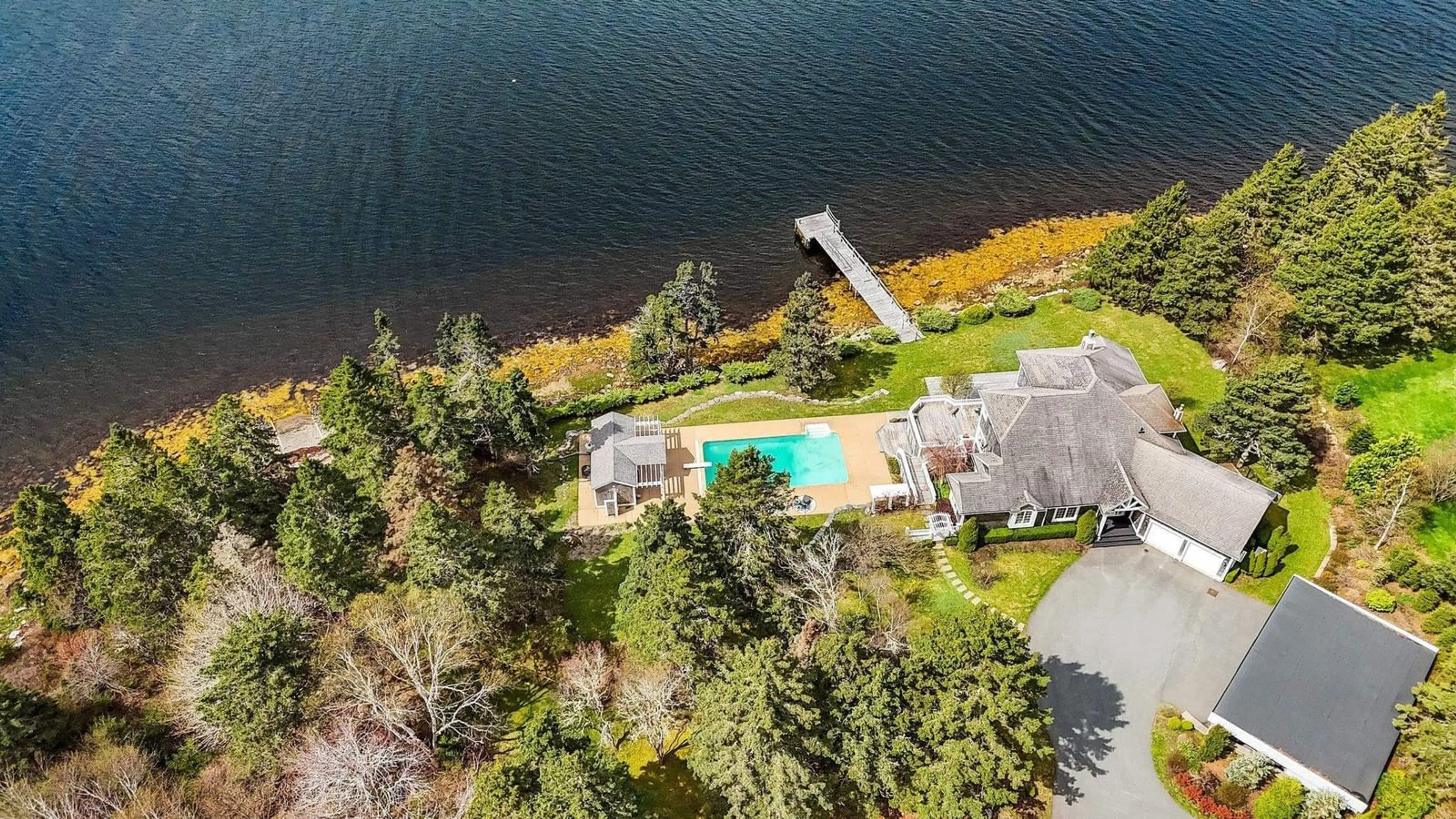 A pic from outside/outdoor area/front of a property/back of a property/a pic from drone, water/lake/river/ocean view for 56 Oceansea Dr, Glen Margaret Nova Scotia B3Z 3G4
