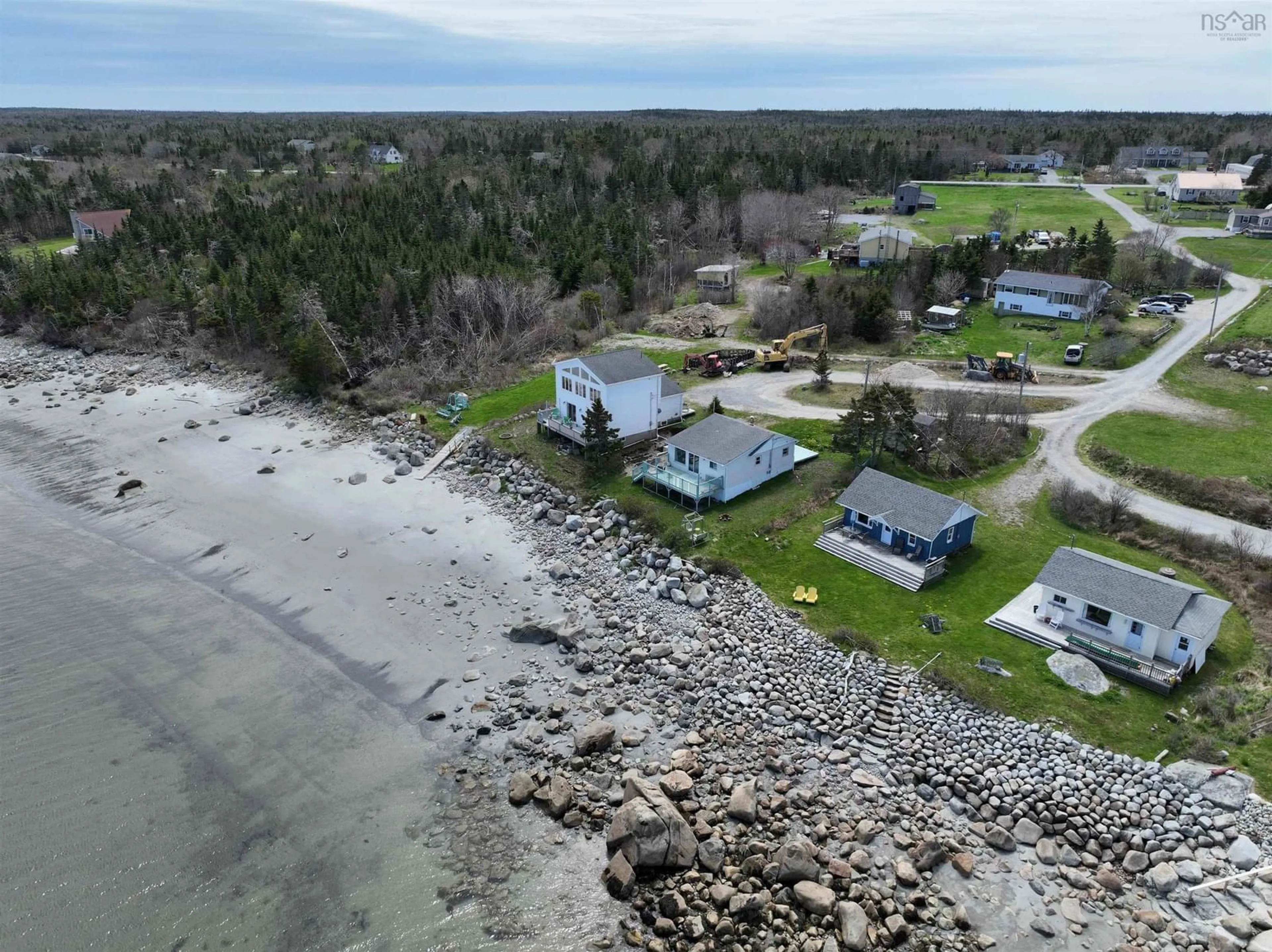 A pic from outside/outdoor area/front of a property/back of a property/a pic from drone, water/lake/river/ocean view for 47 Cabin Rd, North East Point Nova Scotia B0W 2P0