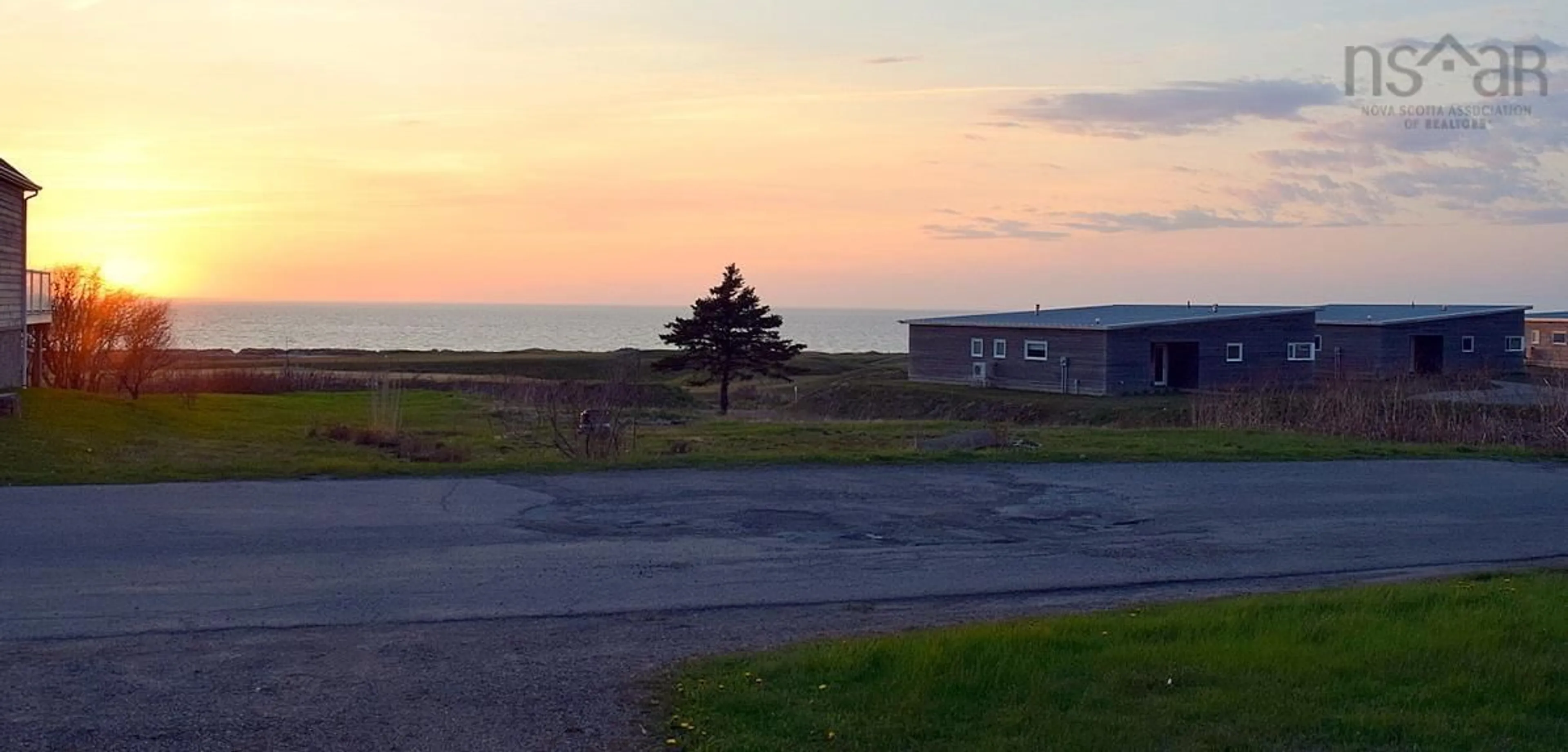 A pic from outside/outdoor area/front of a property/back of a property/a pic from drone, unknown for 46 Mann Ave, Inverness Nova Scotia B0E 1N0