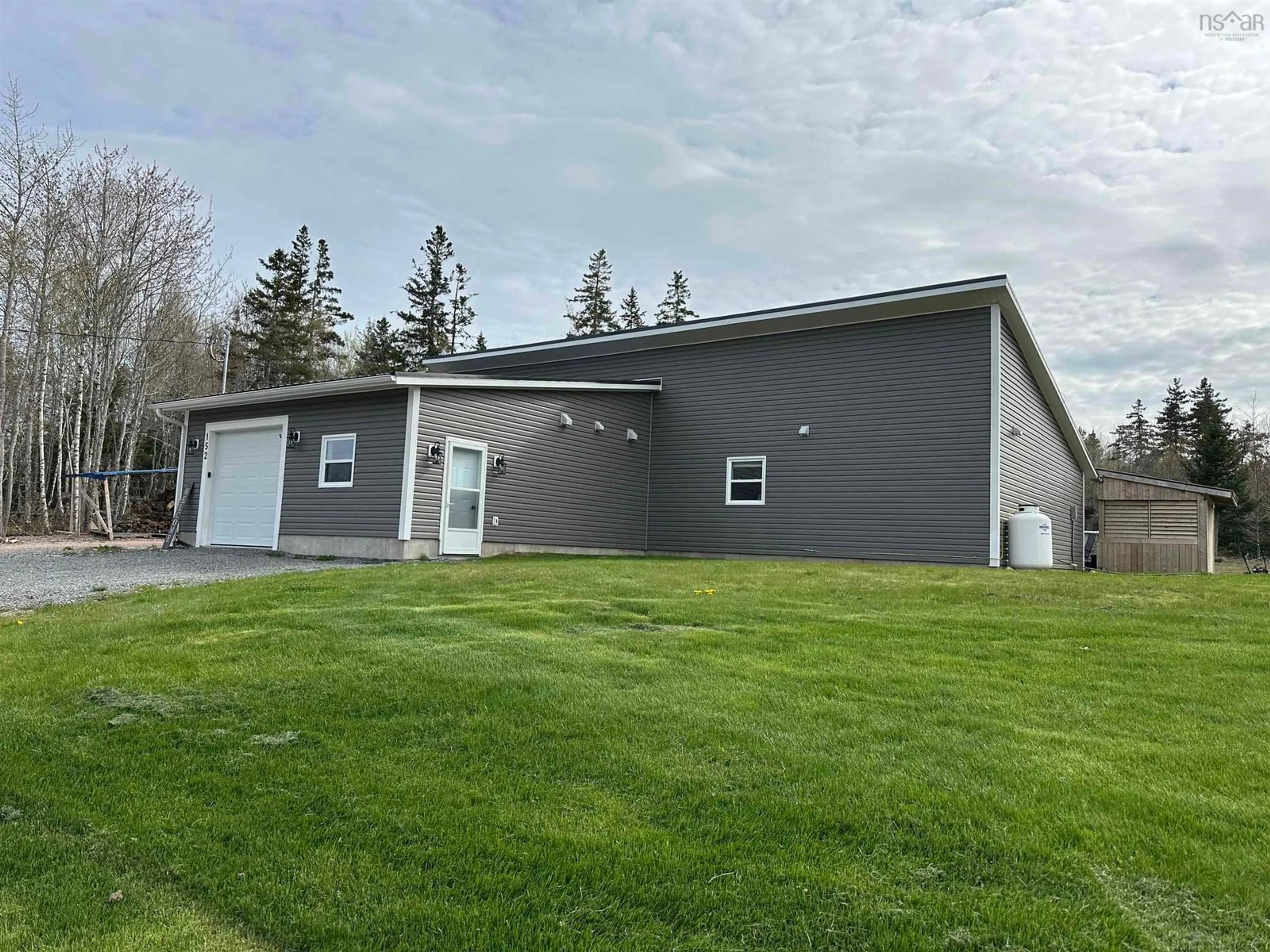 A pic from outside/outdoor area/front of a property/back of a property/a pic from drone, building for 152 Beaton Rd, Coxheath Nova Scotia B1L 1A9