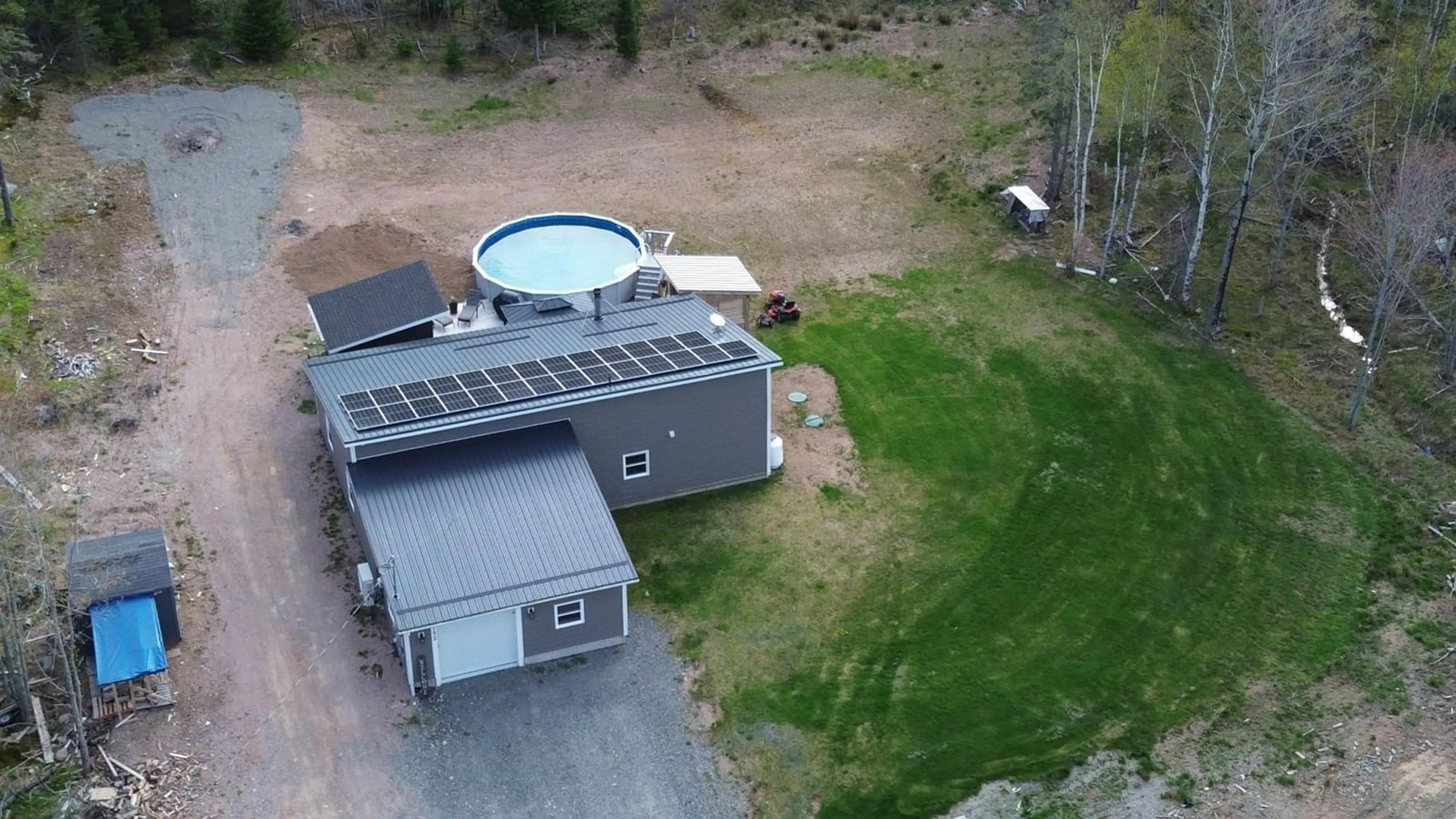 A pic from outside/outdoor area/front of a property/back of a property/a pic from drone, building for 152 Beaton Rd, Coxheath Nova Scotia B1L 1A9