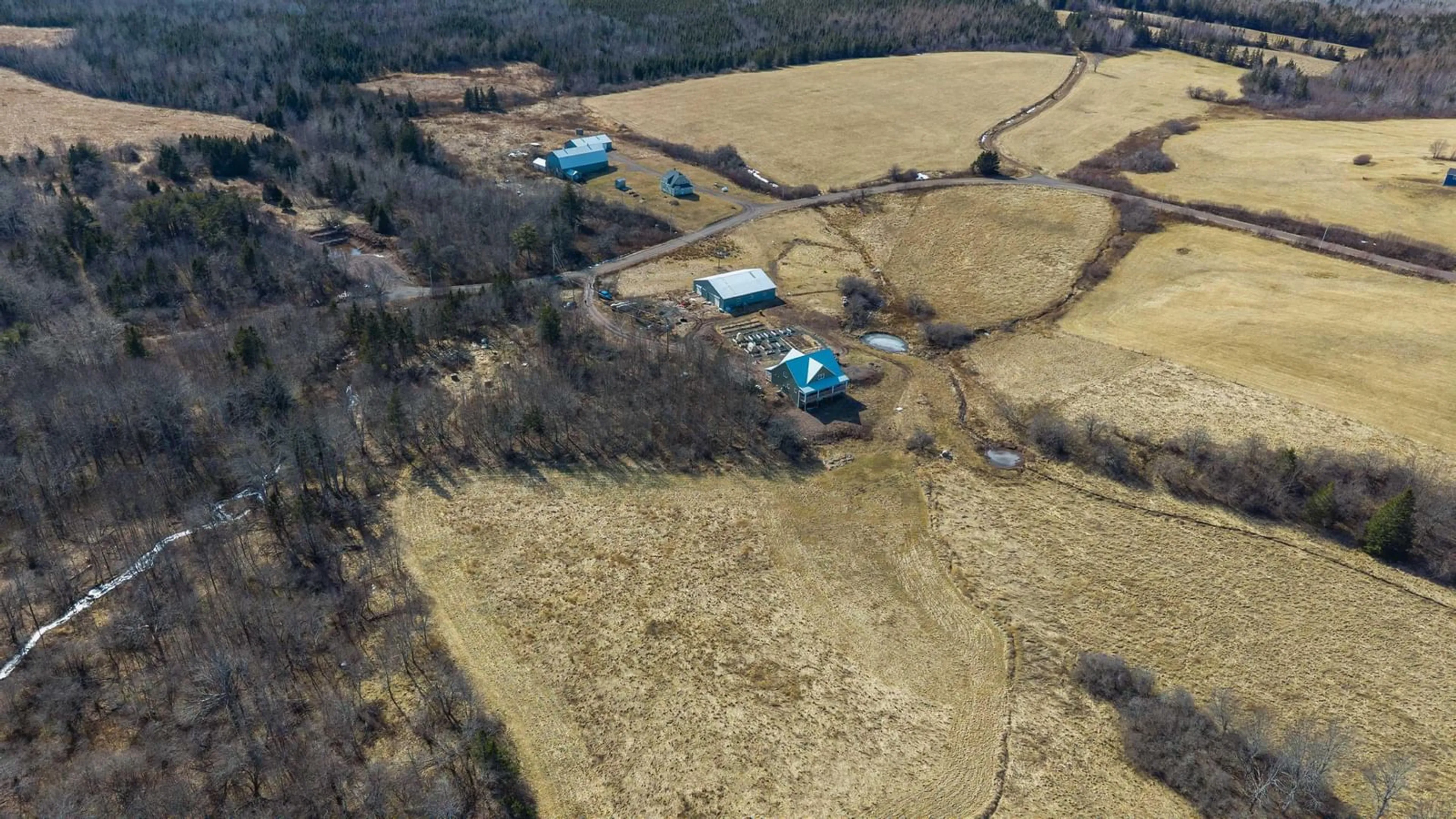 A pic from outside/outdoor area/front of a property/back of a property/a pic from drone, building for 549 Farm Rd, Heatherton Nova Scotia B0H 1R0