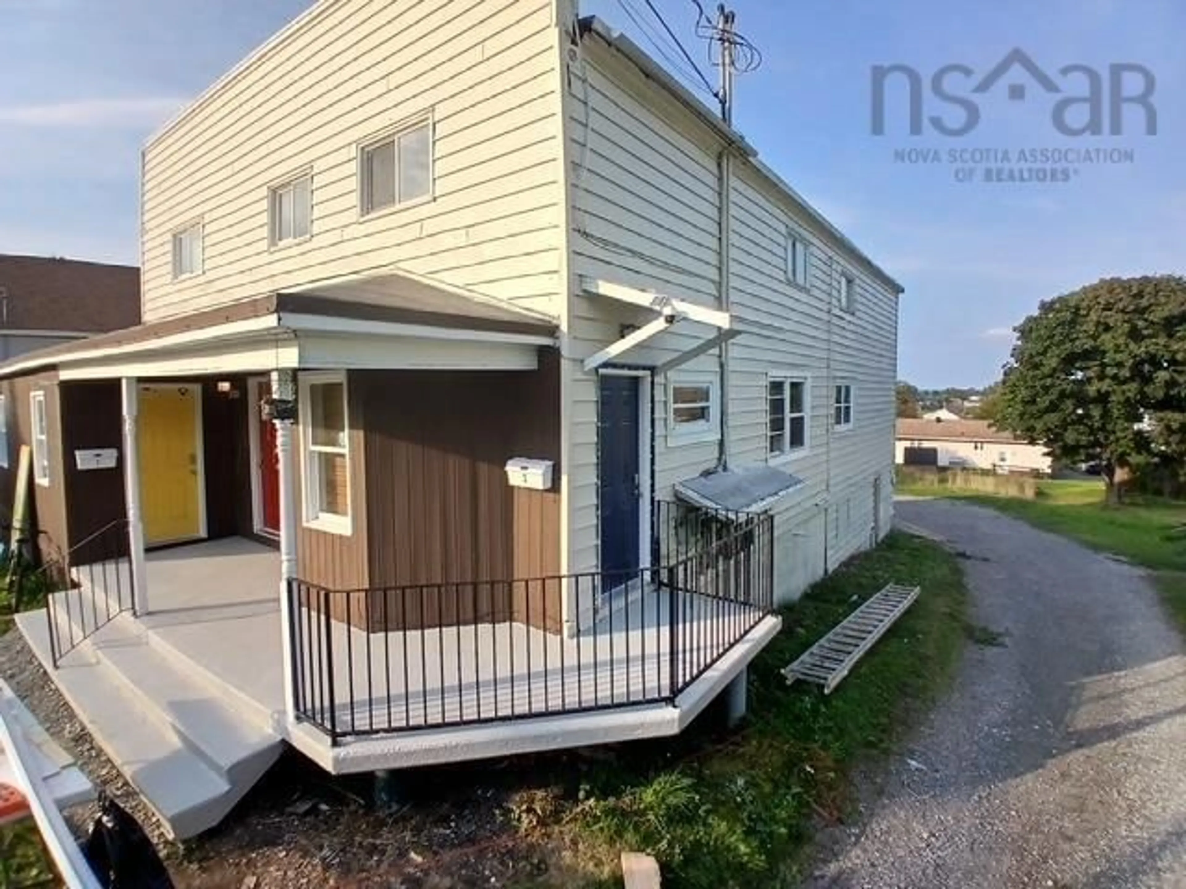 Home with vinyl exterior material, street for 692 Main St, Sydney Mines Nova Scotia B1V 2L2