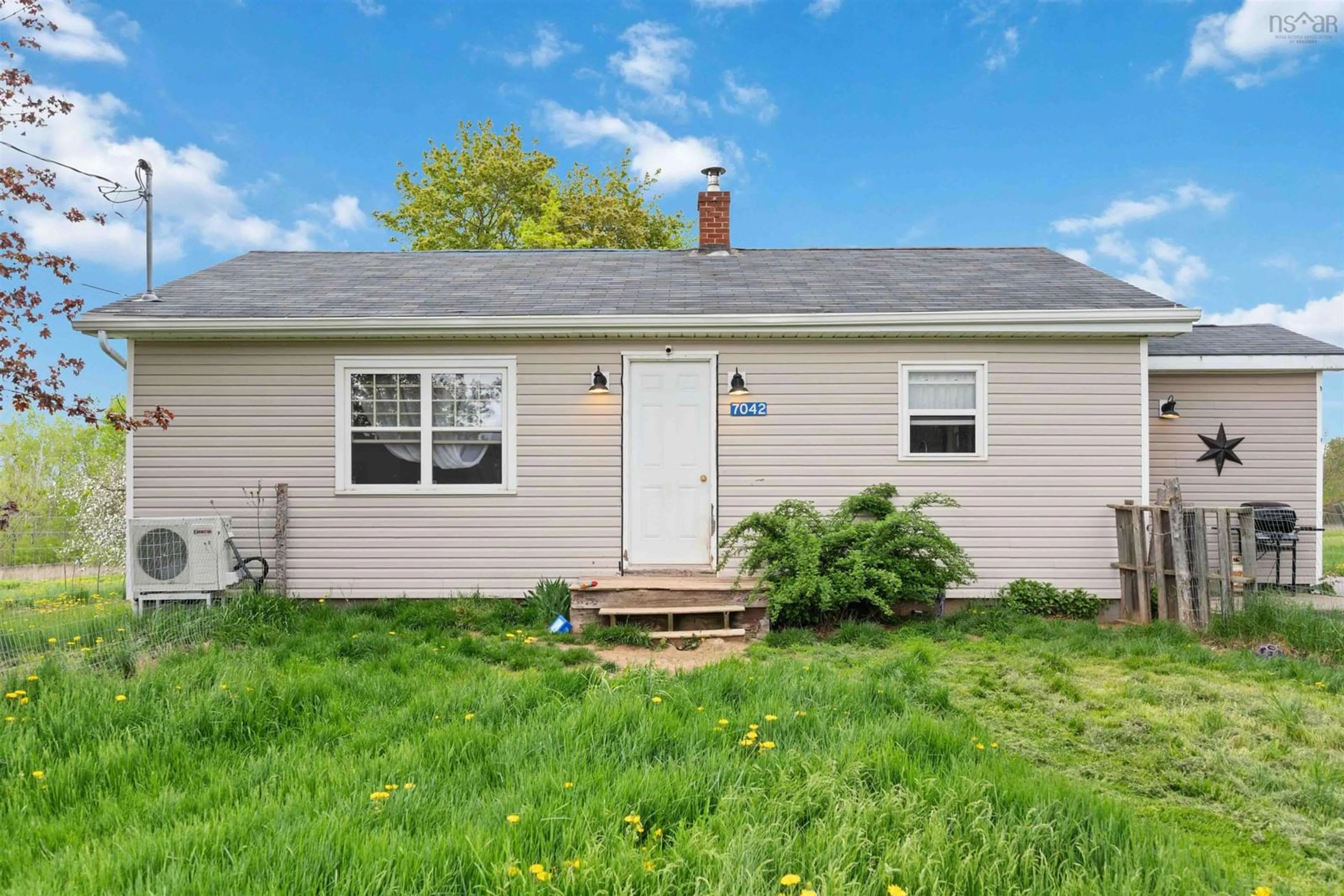 Home with vinyl exterior material, street for 7042 Aylesford Rd, Factorydale Nova Scotia B0P 1C0