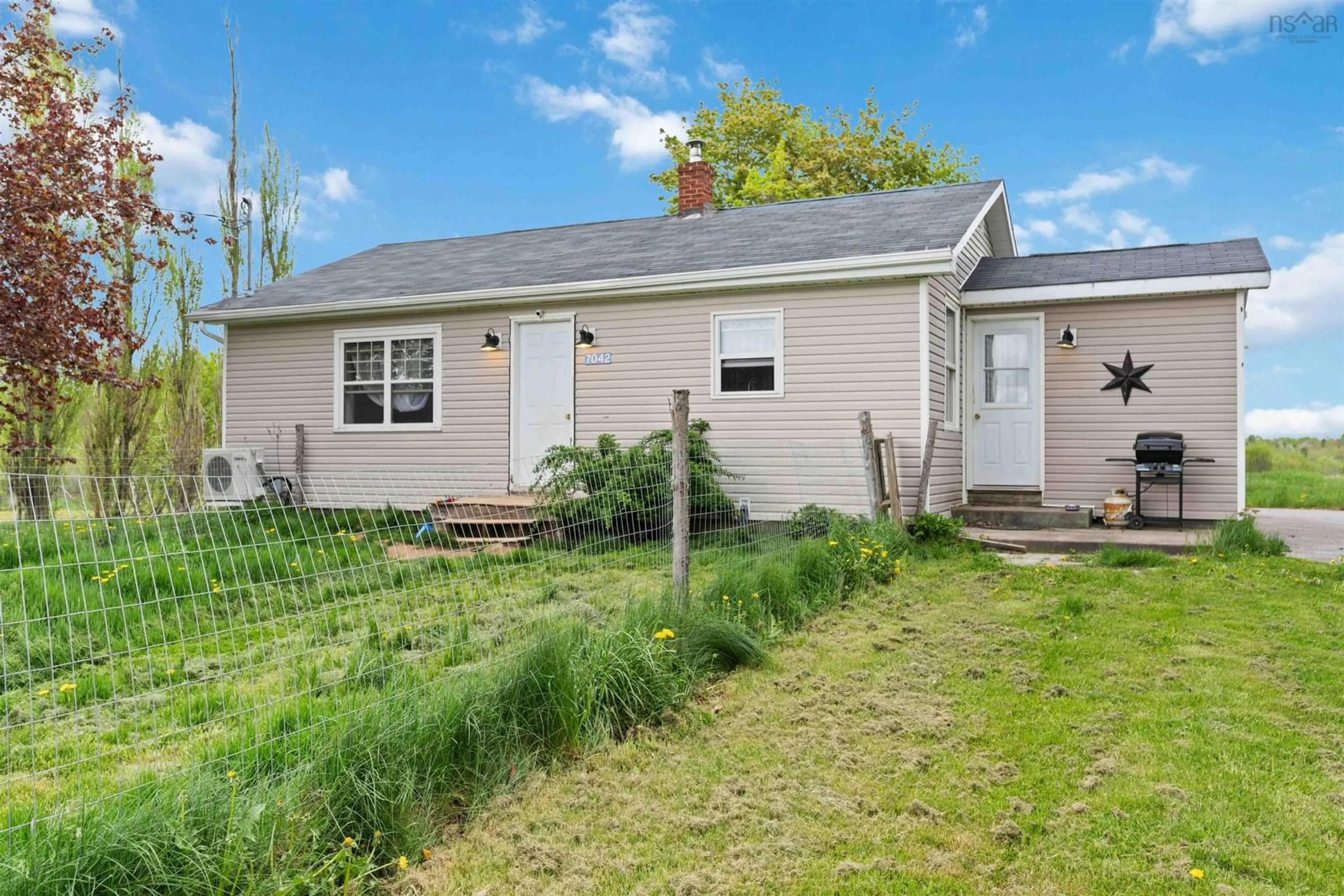 Home with vinyl exterior material, street for 7042 Aylesford Rd, Factorydale Nova Scotia B0P 1C0