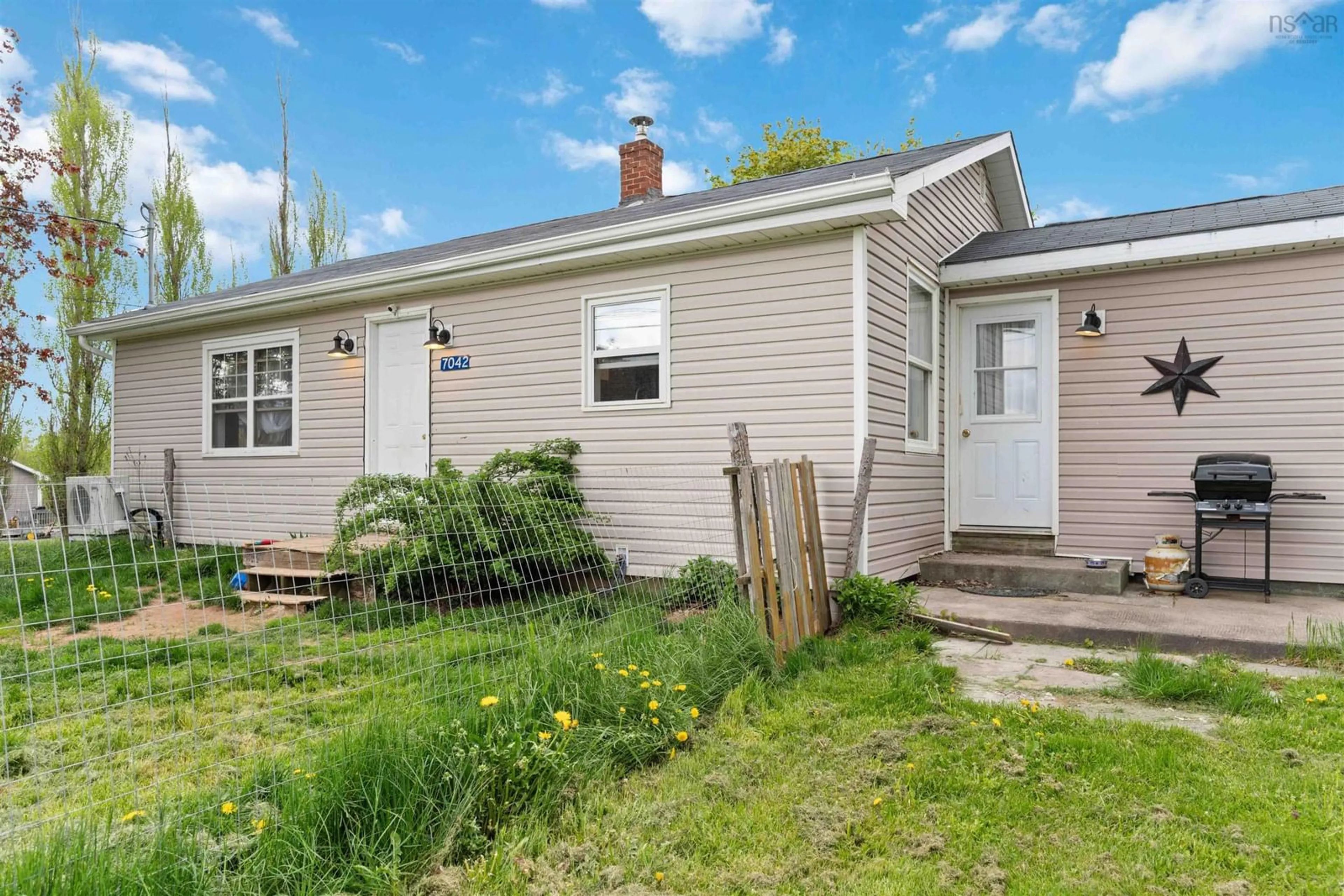 Home with vinyl exterior material, street for 7042 Aylesford Rd, Factorydale Nova Scotia B0P 1C0