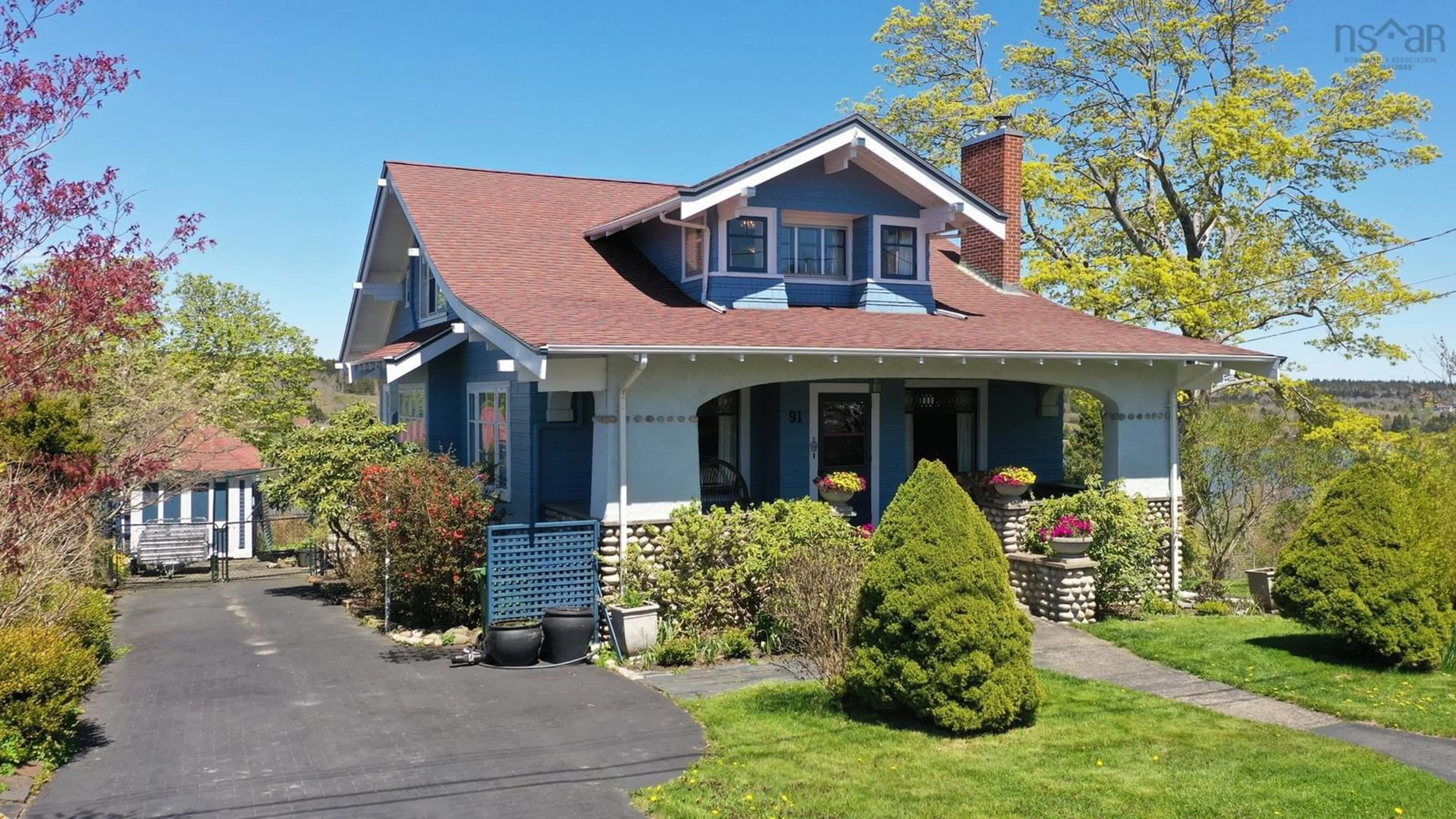 Home with vinyl exterior material, street for 91 Creighton St, Lunenburg Nova Scotia B0J 2C0