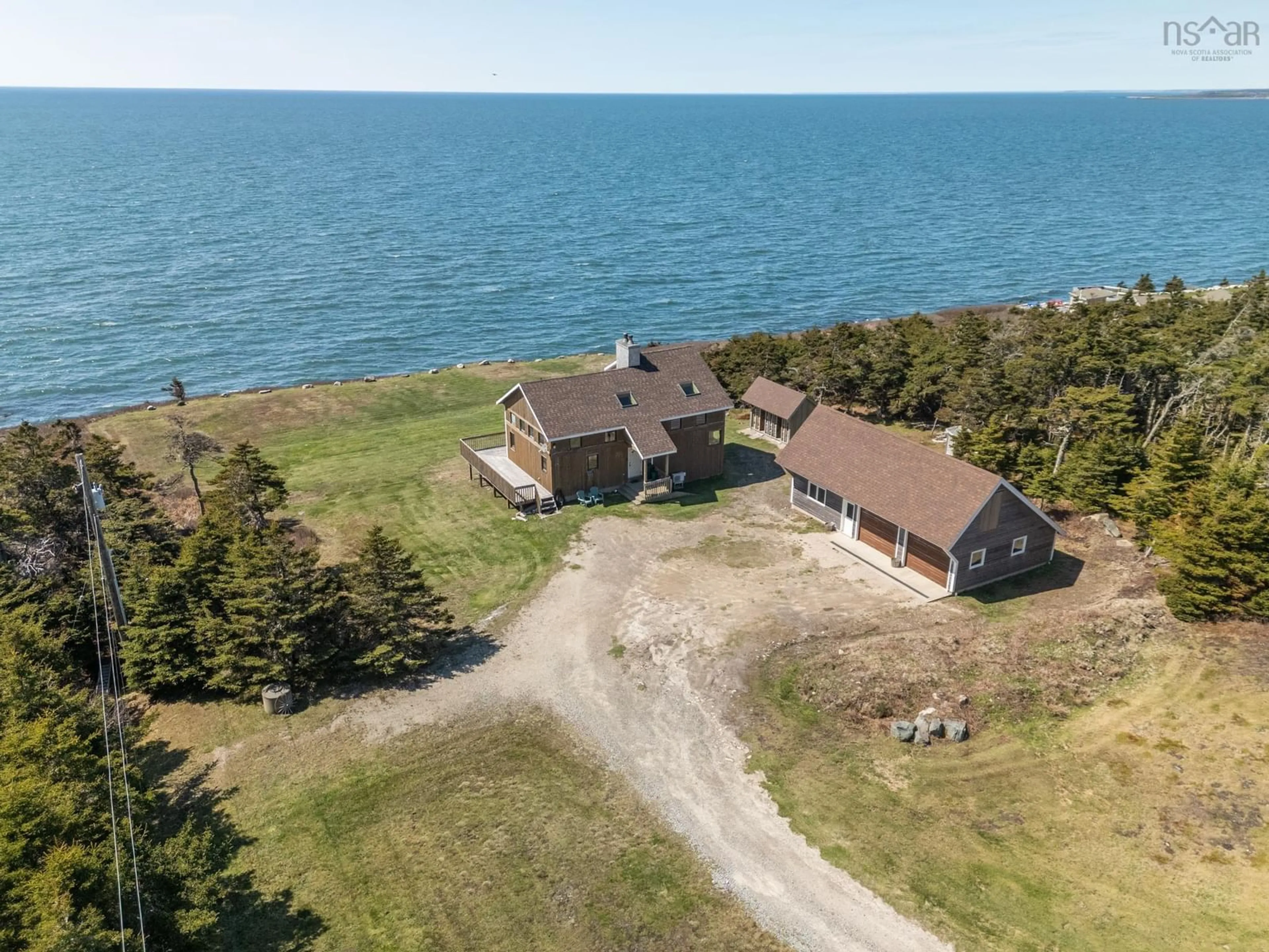A pic from outside/outdoor area/front of a property/back of a property/a pic from drone, water/lake/river/ocean view for 194 Thomas Rd, Cape Forchu Nova Scotia B5A 5G7