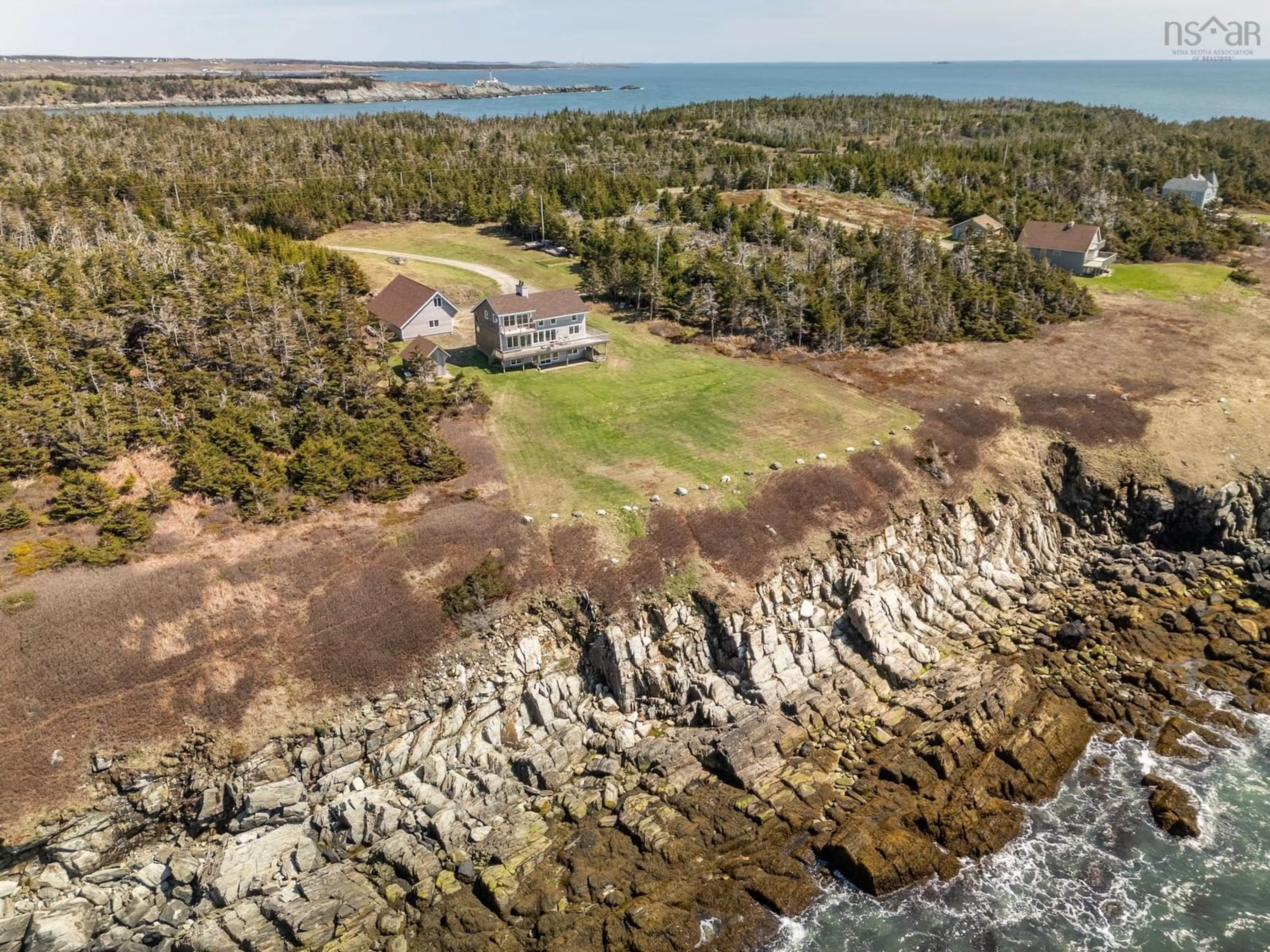 A pic from outside/outdoor area/front of a property/back of a property/a pic from drone, water/lake/river/ocean view for 194 Thomas Rd, Cape Forchu Nova Scotia B5A 5G7