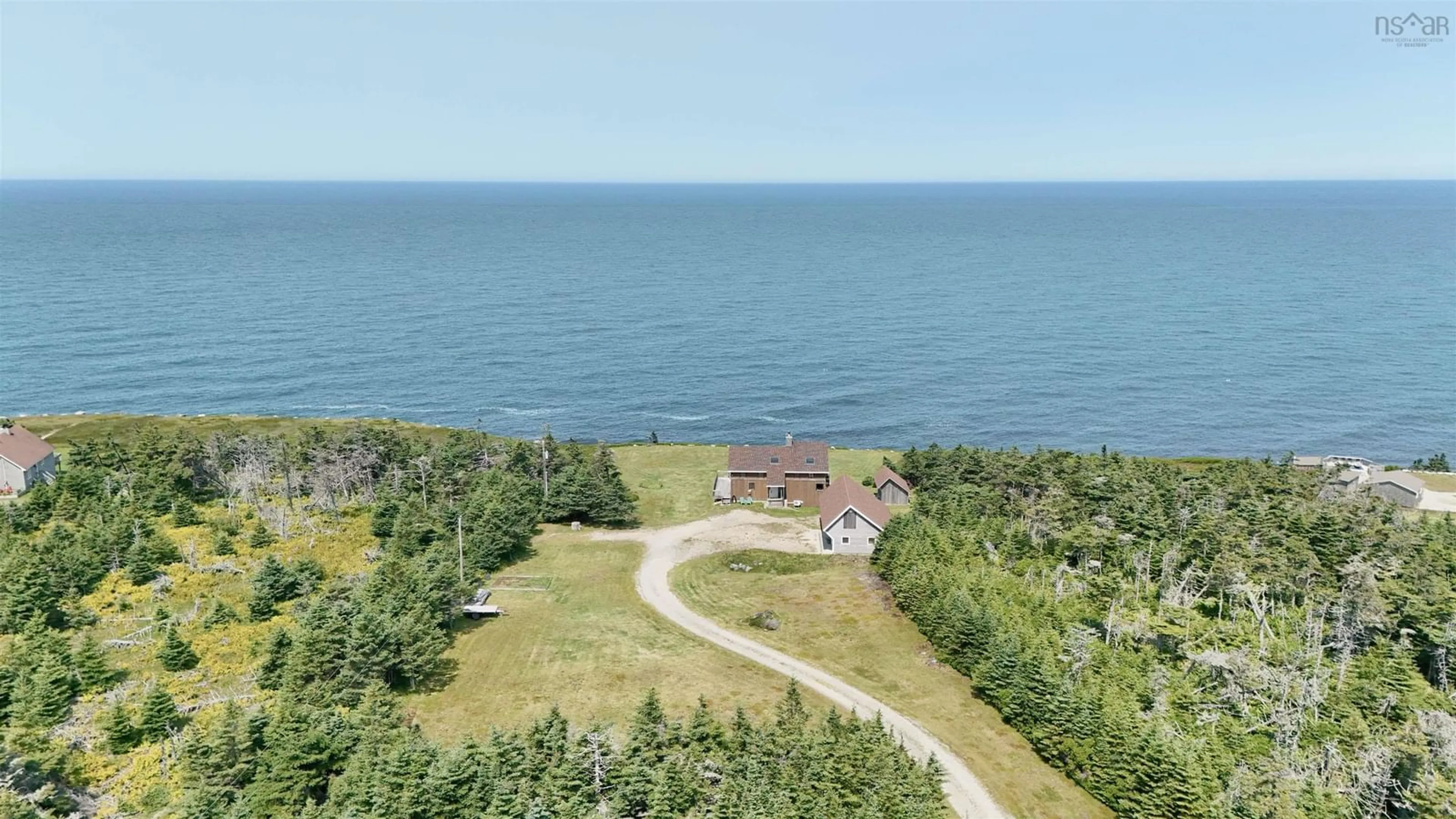 A pic from outside/outdoor area/front of a property/back of a property/a pic from drone, water/lake/river/ocean view for 194 Thomas Rd, Cape Forchu Nova Scotia B5A 5G7