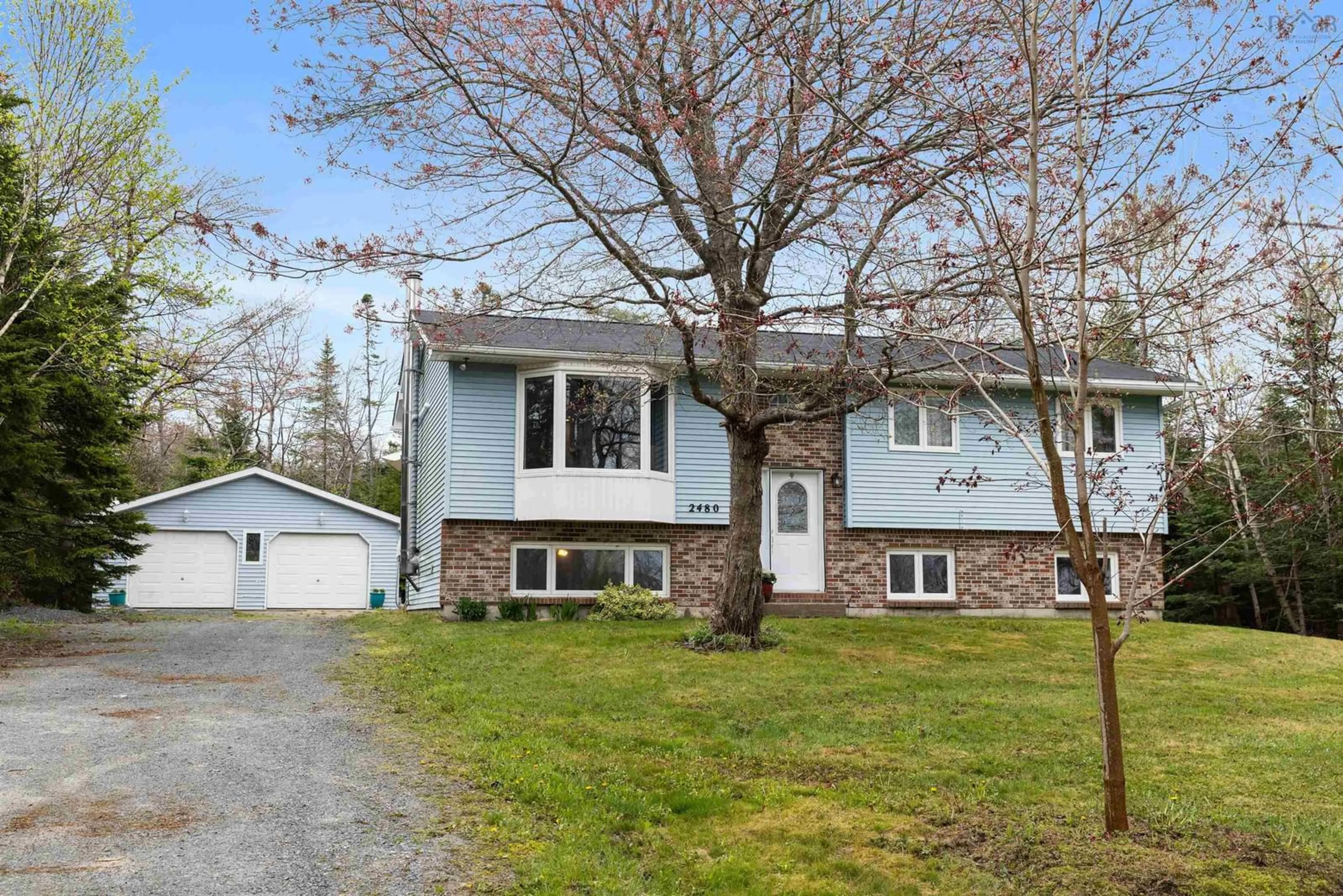 Home with vinyl exterior material, street for 2480 Prospect Rd, Hatchet Lake Nova Scotia B3T 1V3