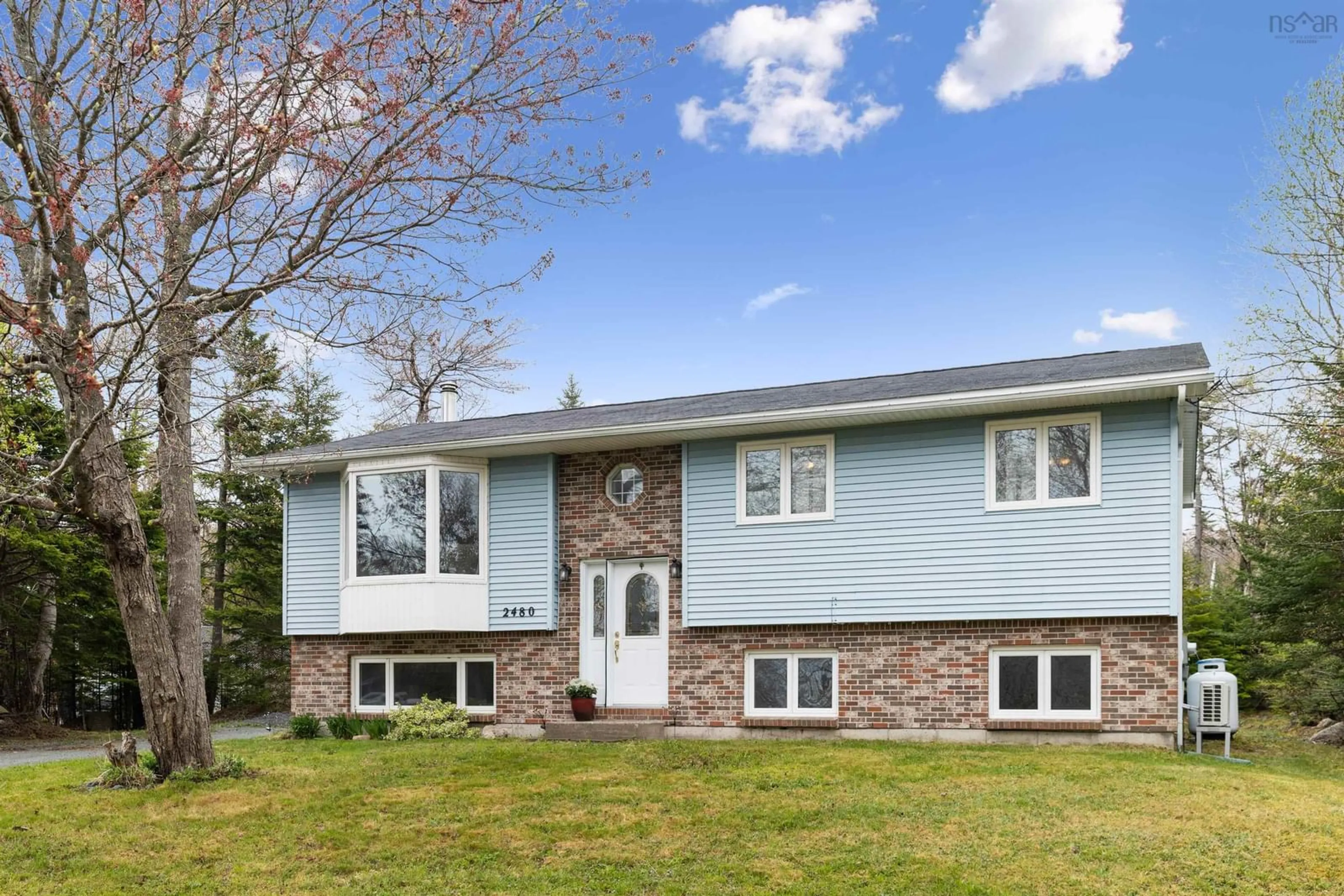 Home with vinyl exterior material, street for 2480 Prospect Rd, Hatchet Lake Nova Scotia B3T 1V3