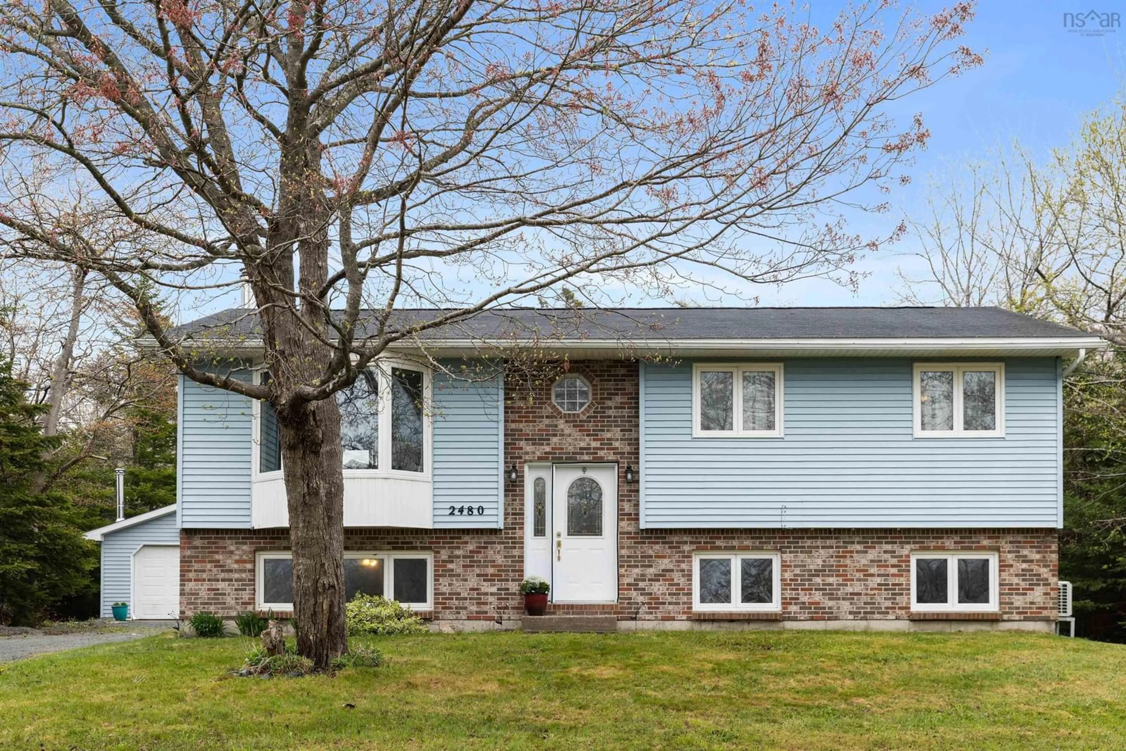Home with vinyl exterior material, street for 2480 Prospect Rd, Hatchet Lake Nova Scotia B3T 1V3