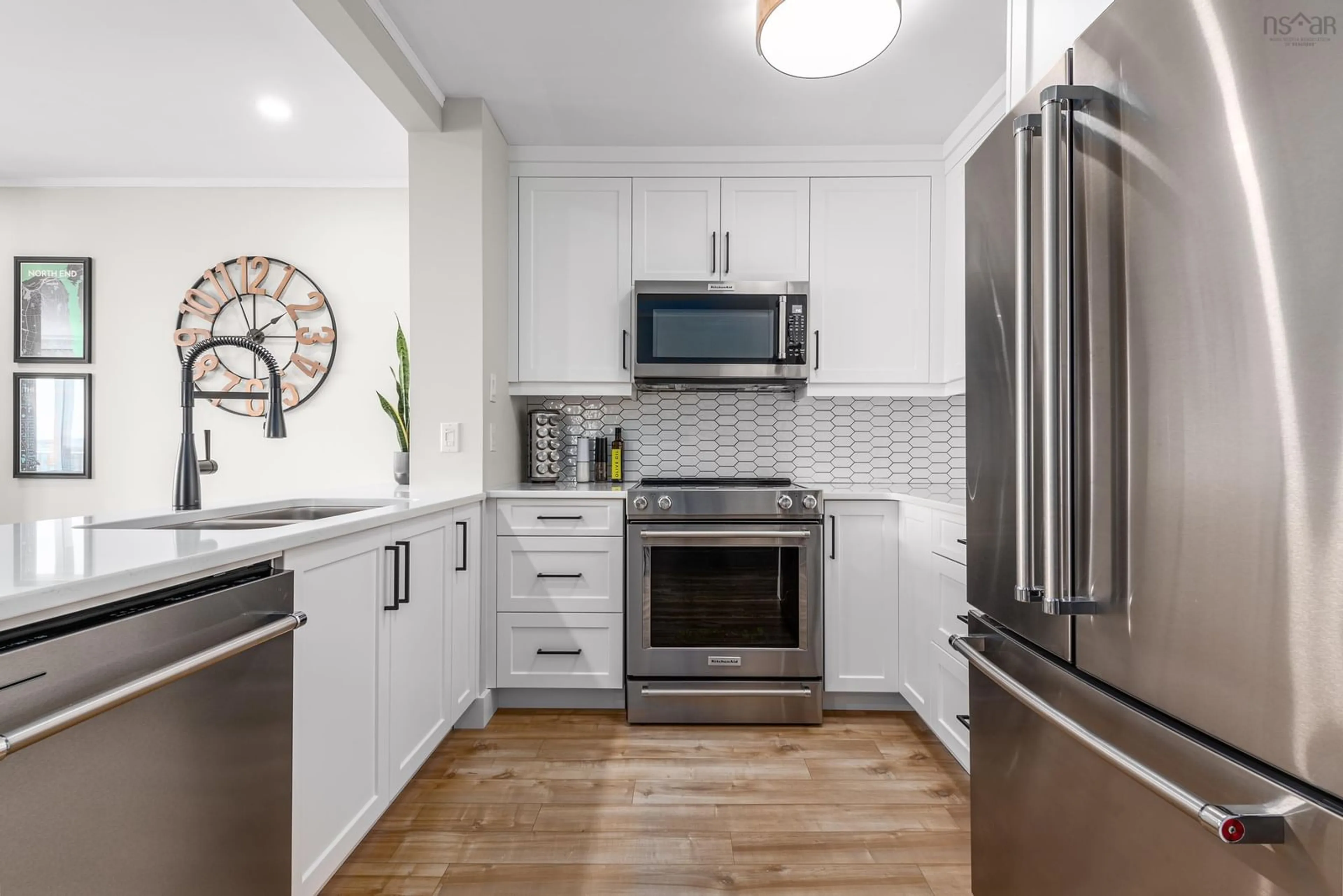Open concept kitchen, unknown for 5572 North Ridge Rd #PH8, Halifax Peninsula Nova Scotia B3K 5K2