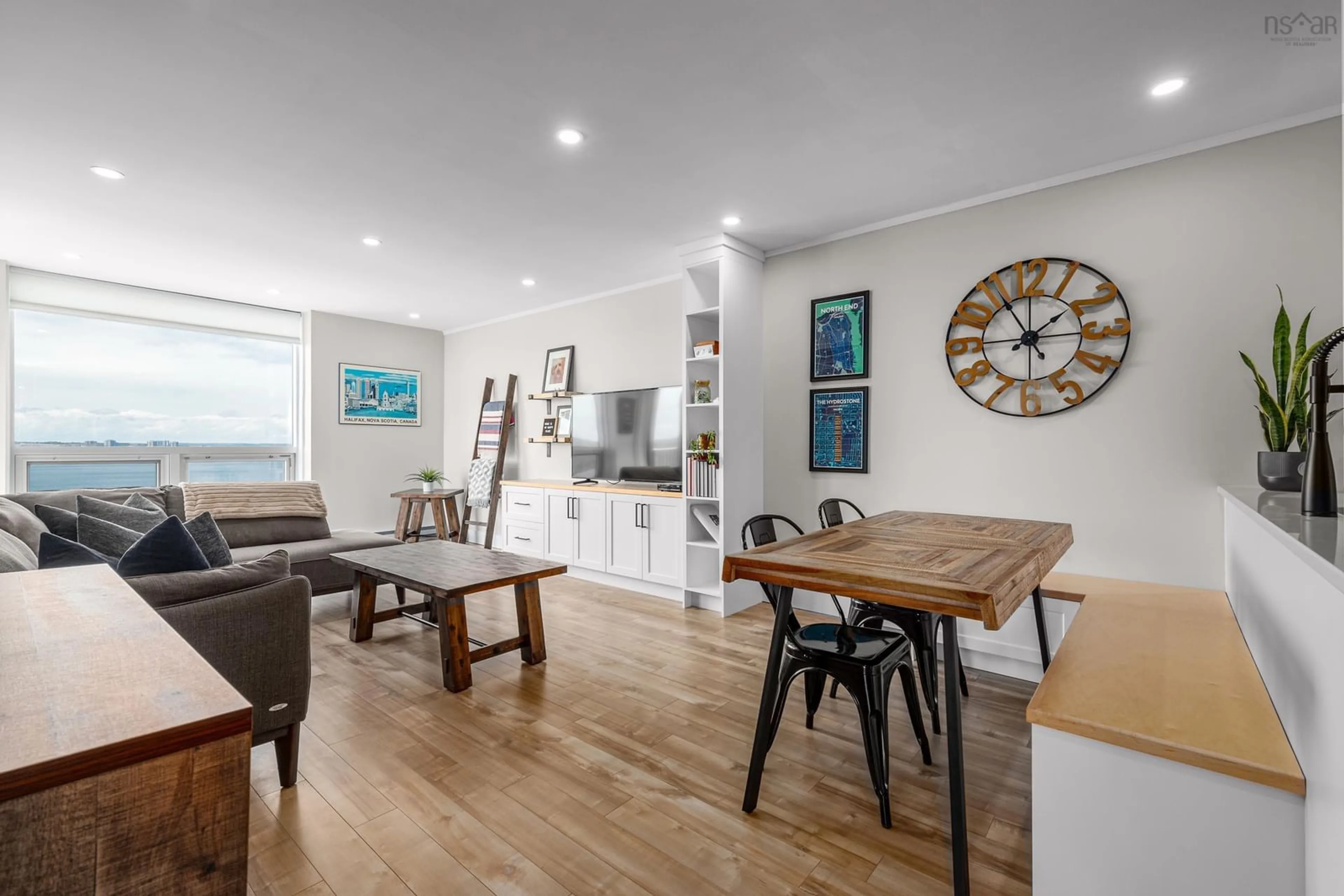 Open concept kitchen, wood/laminate floor for 5572 North Ridge Rd #PH8, Halifax Peninsula Nova Scotia B3K 5K2