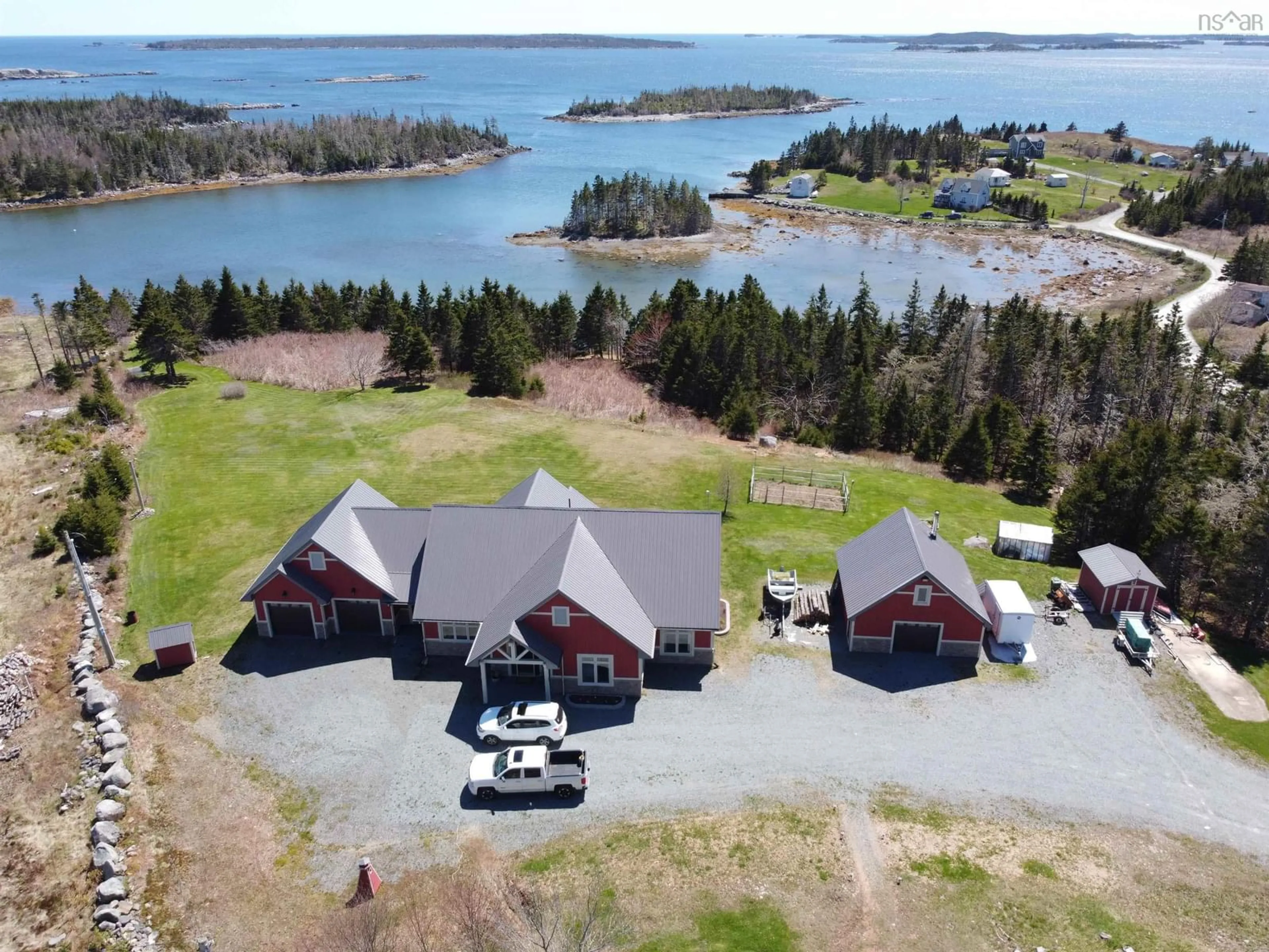 A pic from outside/outdoor area/front of a property/back of a property/a pic from drone, water/lake/river/ocean view for 65 Monks Road, East Ship Harbour Nova Scotia B0J 3H0