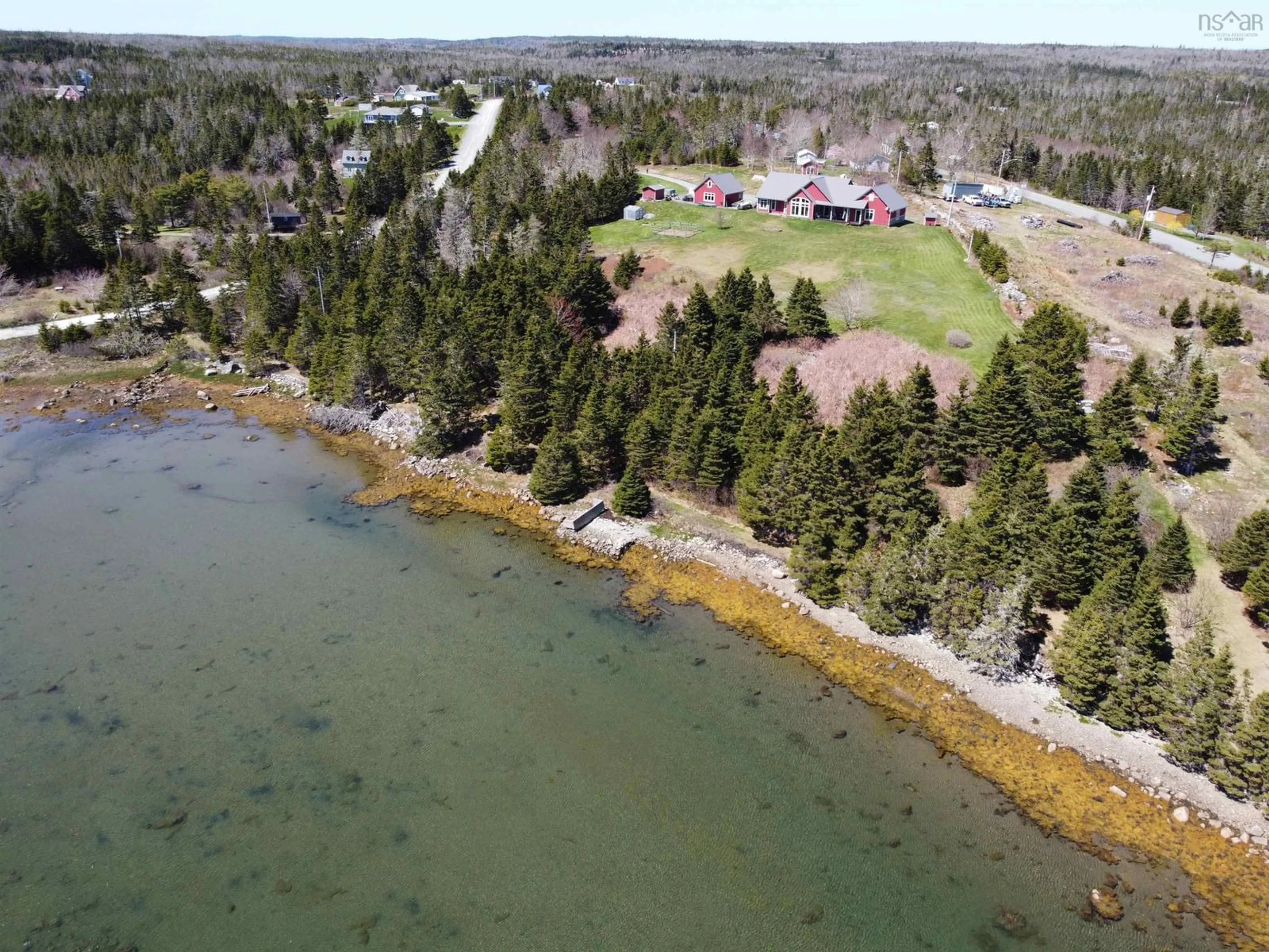 A pic from outside/outdoor area/front of a property/back of a property/a pic from drone, water/lake/river/ocean view for 65 Monks Road, East Ship Harbour Nova Scotia B0J 3H0