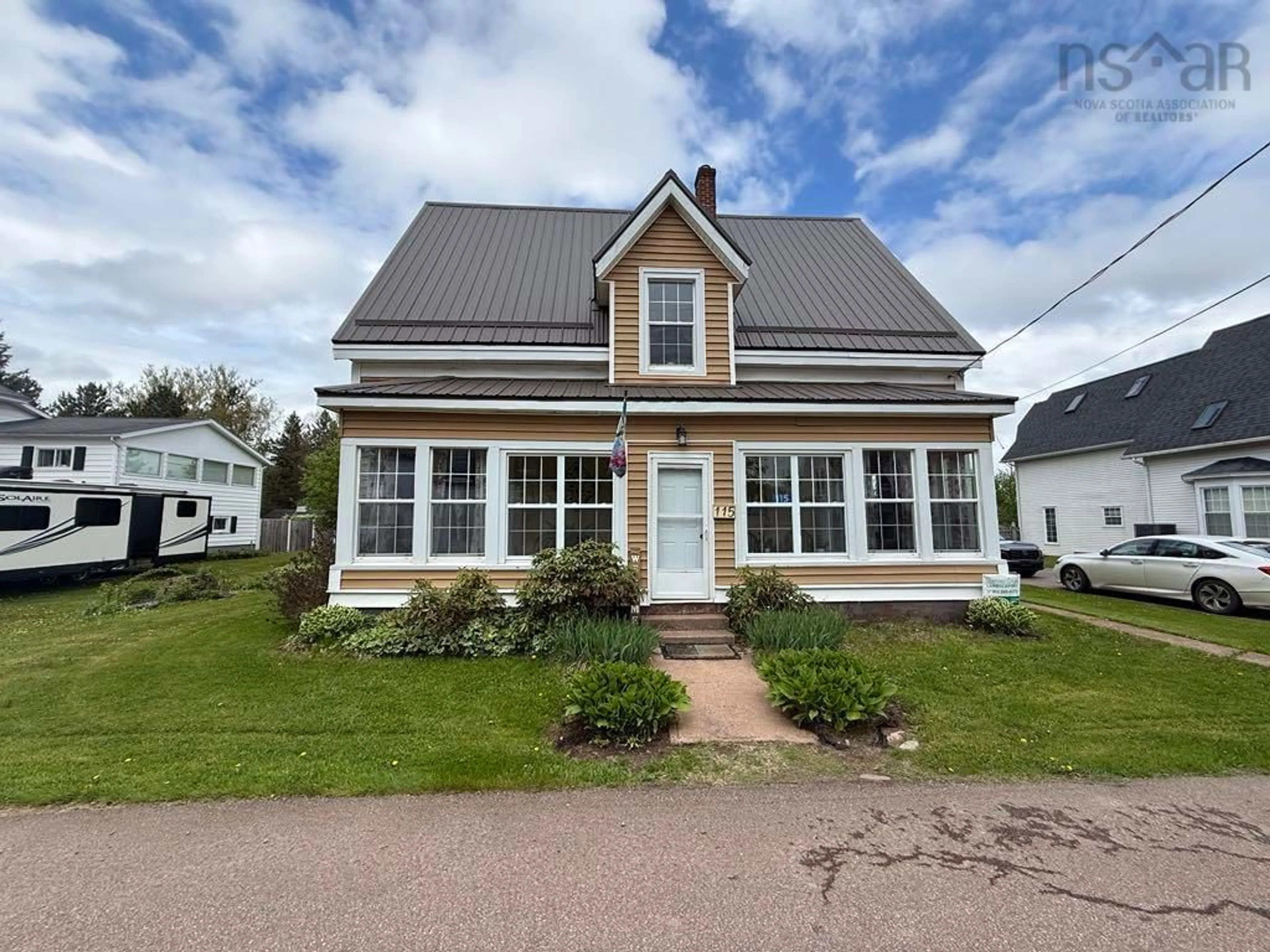 Home with vinyl exterior material, street for 115 James Street, Oxford Nova Scotia B0M 1P0