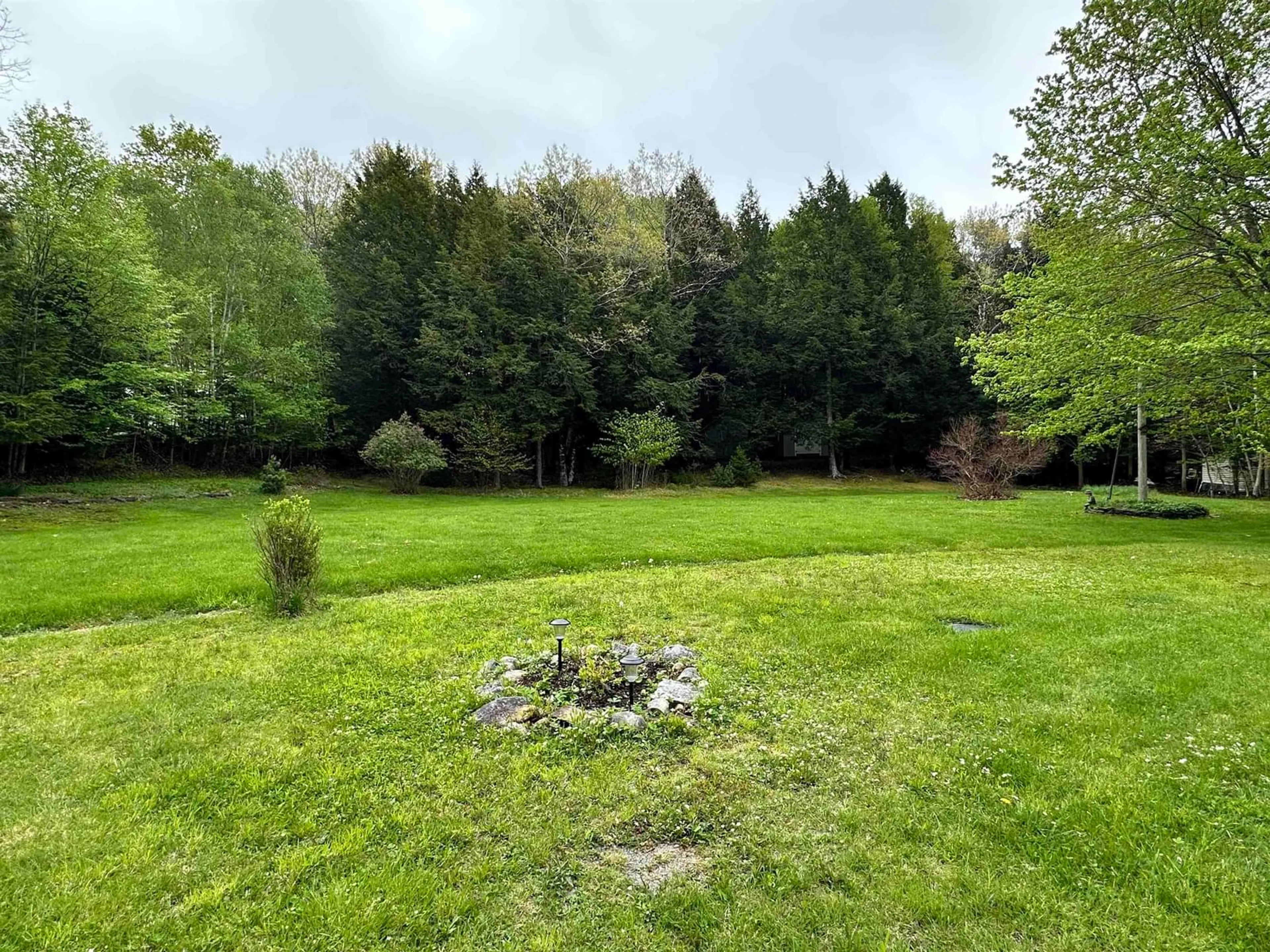 A pic from outside/outdoor area/front of a property/back of a property/a pic from drone, forest/trees view for 2 Delcon Ave, Pine Grove Nova Scotia B4V 8B2