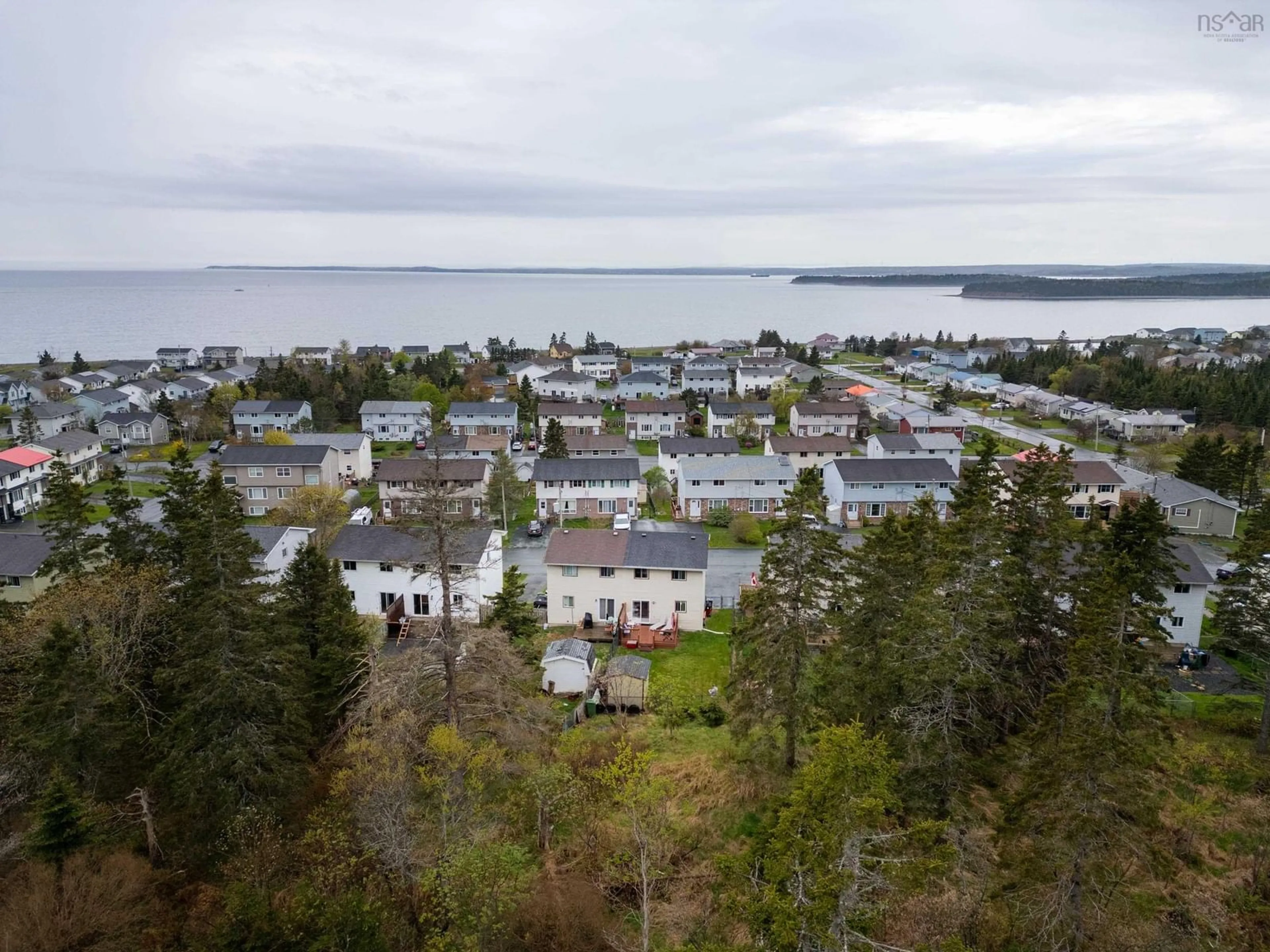 A pic from outside/outdoor area/front of a property/back of a property/a pic from drone, water/lake/river/ocean view for 92 Romkey Drive, Eastern Passage Nova Scotia B3G 1H2